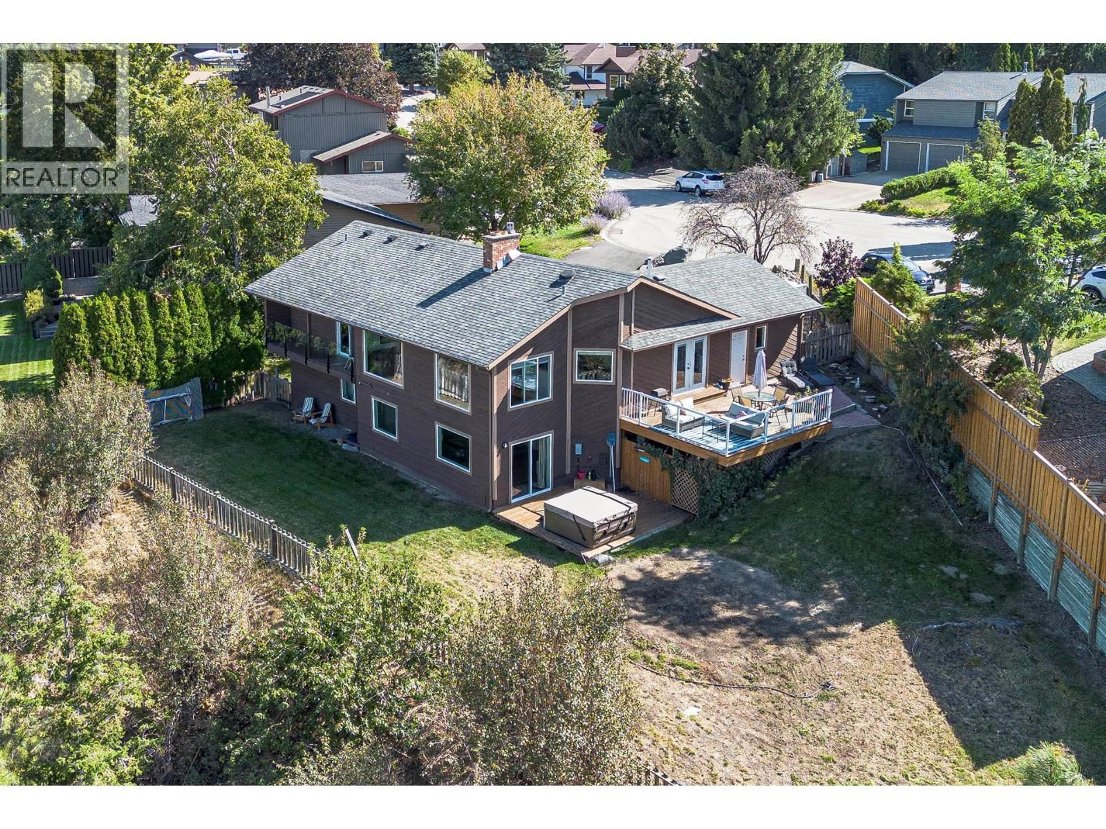 A pic from outside/outdoor area/front of a property/back of a property/a pic from drone, street for 2404 BELLA COOLA COURT, Kamloops British Columbia V2E1T7