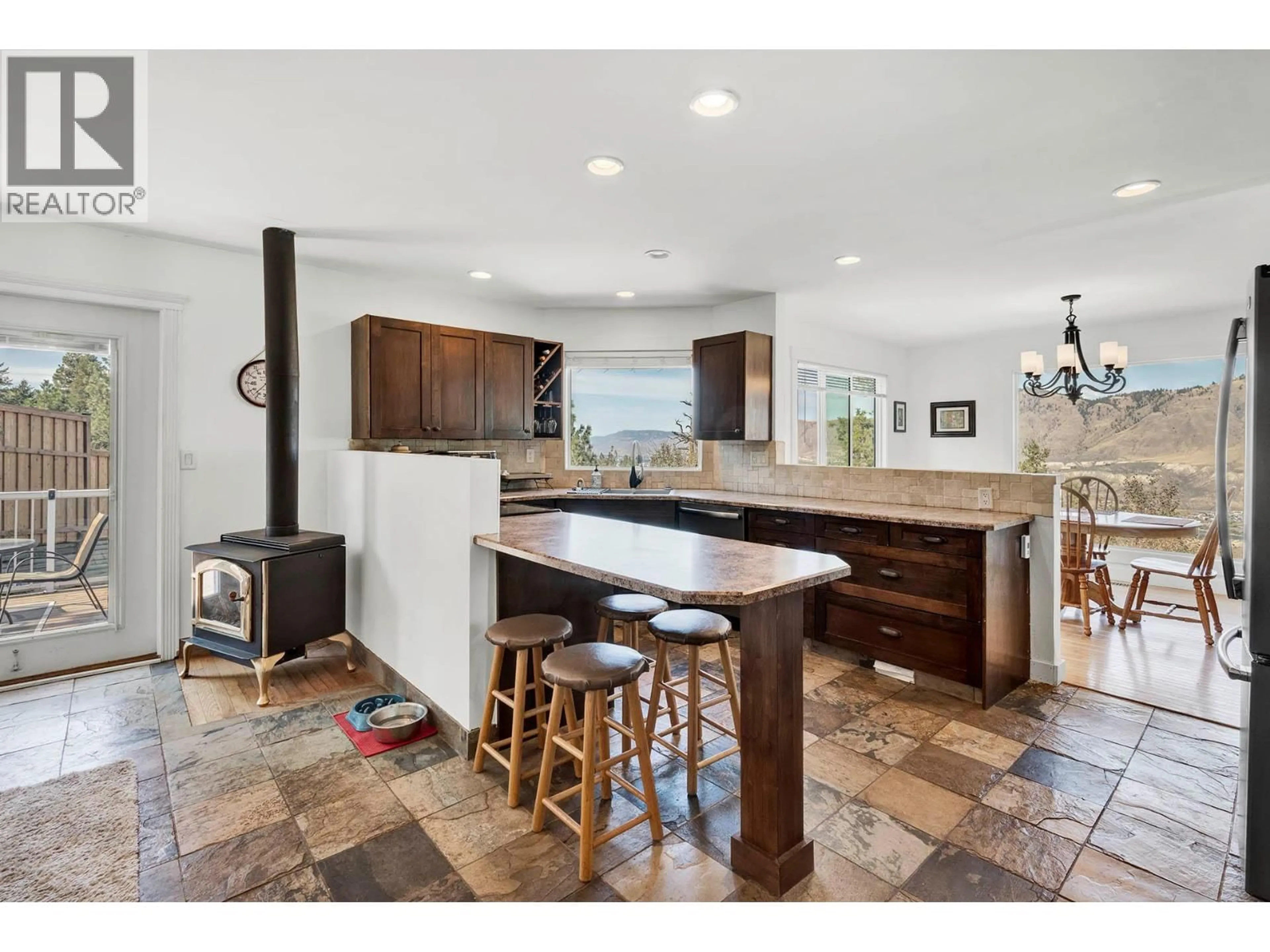 Open concept kitchen, ceramic/tile floor for 2404 BELLA COOLA COURT, Kamloops British Columbia V2E1T7