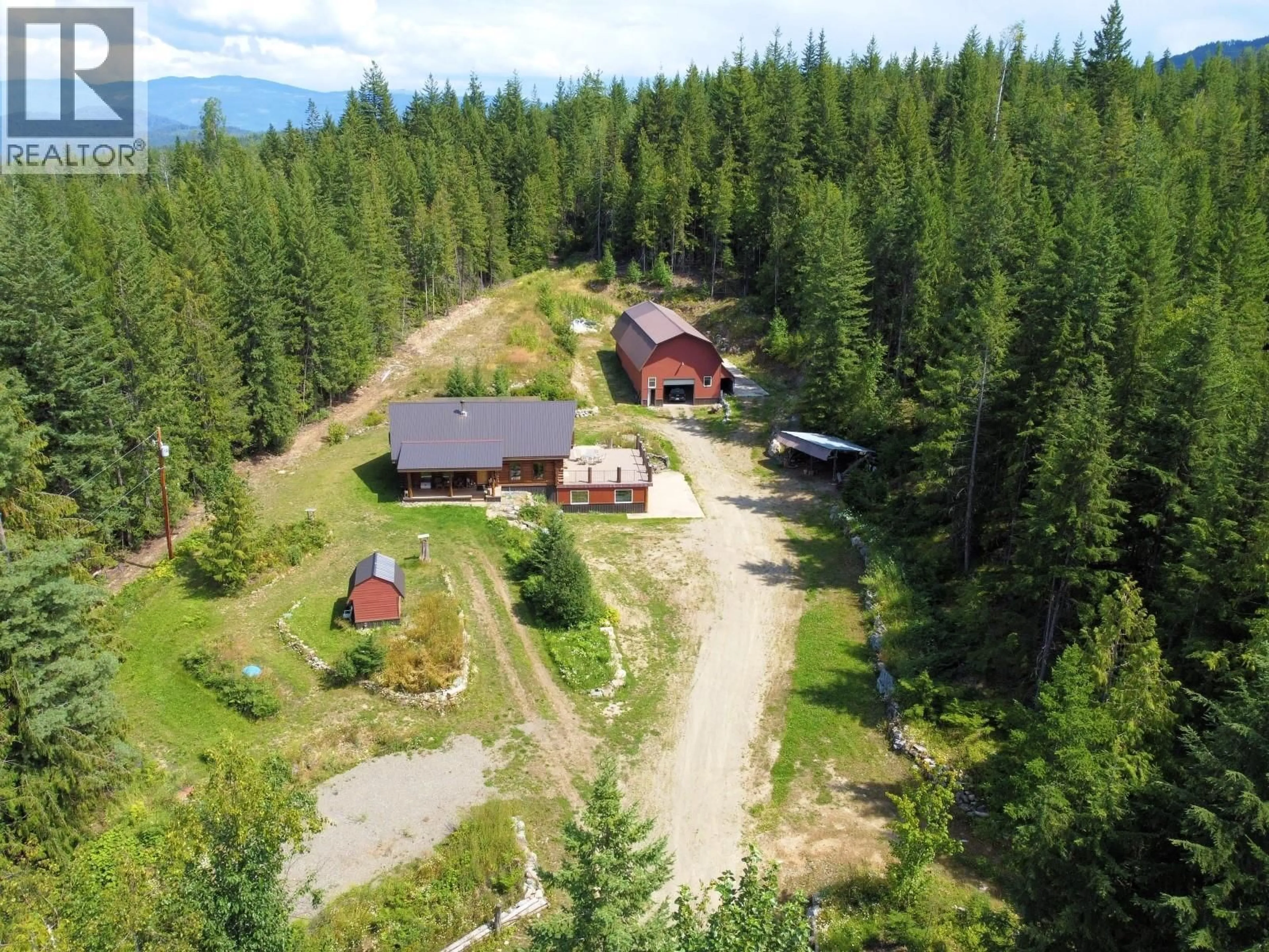 A pic from outside/outdoor area/front of a property/back of a property/a pic from drone, forest/trees view for 3740 CAMERON ROAD, Eagle Bay British Columbia V0E1T0