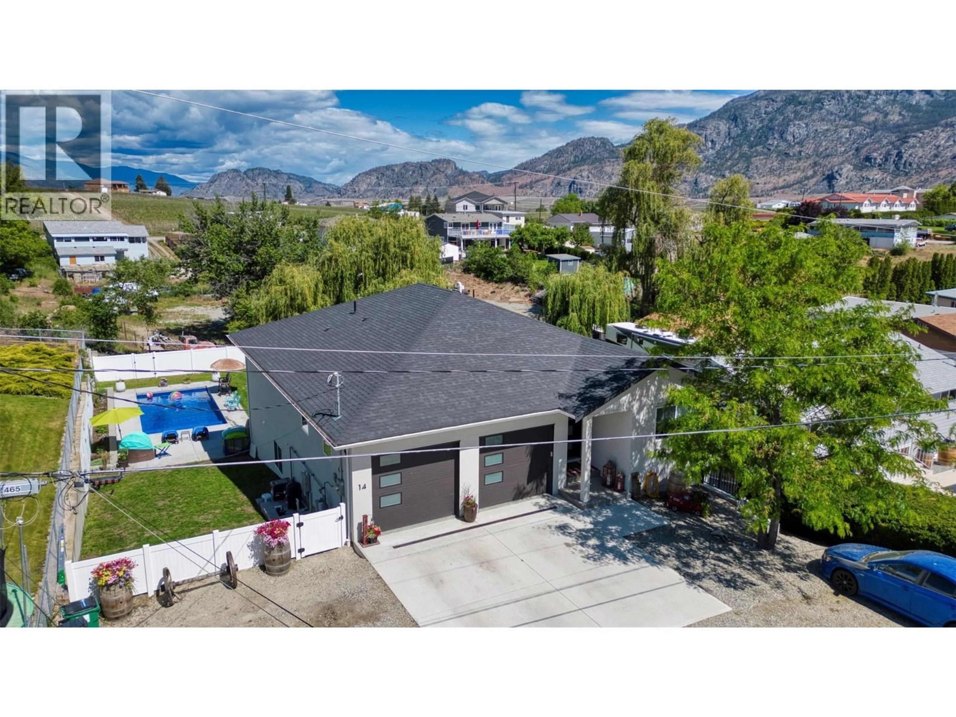 A pic from outside/outdoor area/front of a property/back of a property/a pic from drone, mountain view for 14 LAMBERT COURT, Osoyoos British Columbia V0H1V1