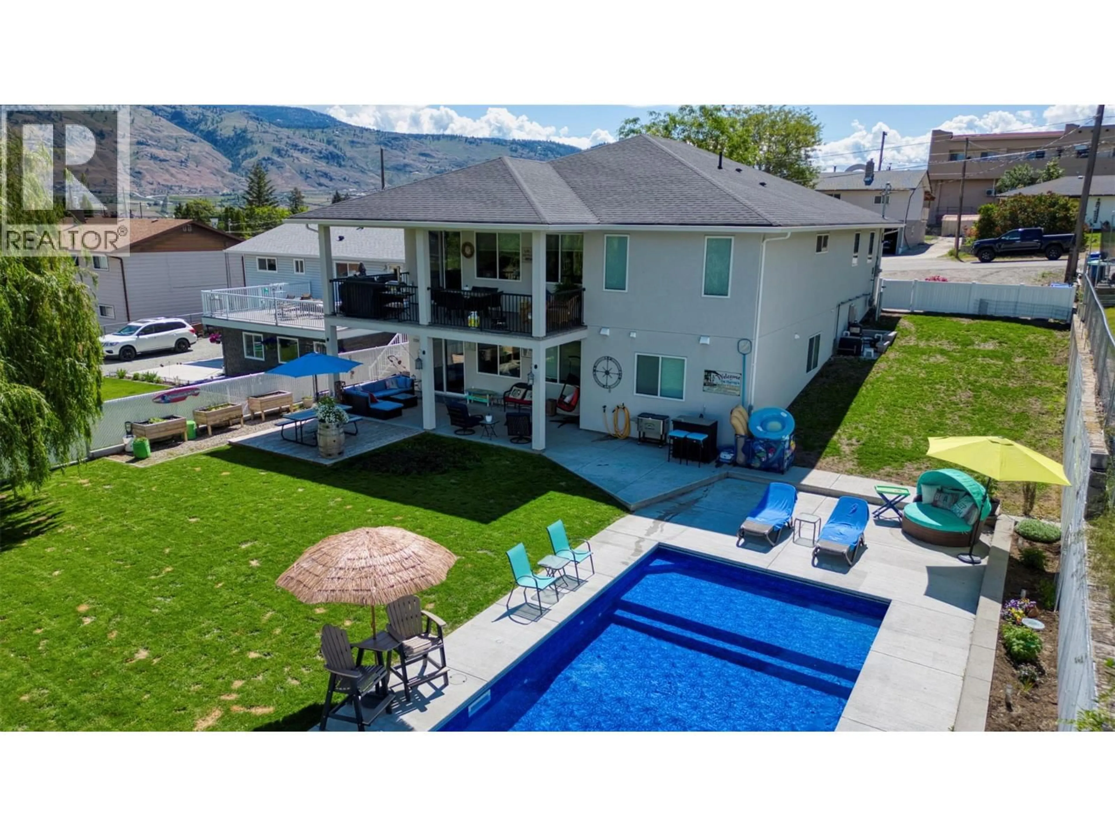 A pic from outside/outdoor area/front of a property/back of a property/a pic from drone, mountain view for 14 LAMBERT COURT, Osoyoos British Columbia V0H1V1