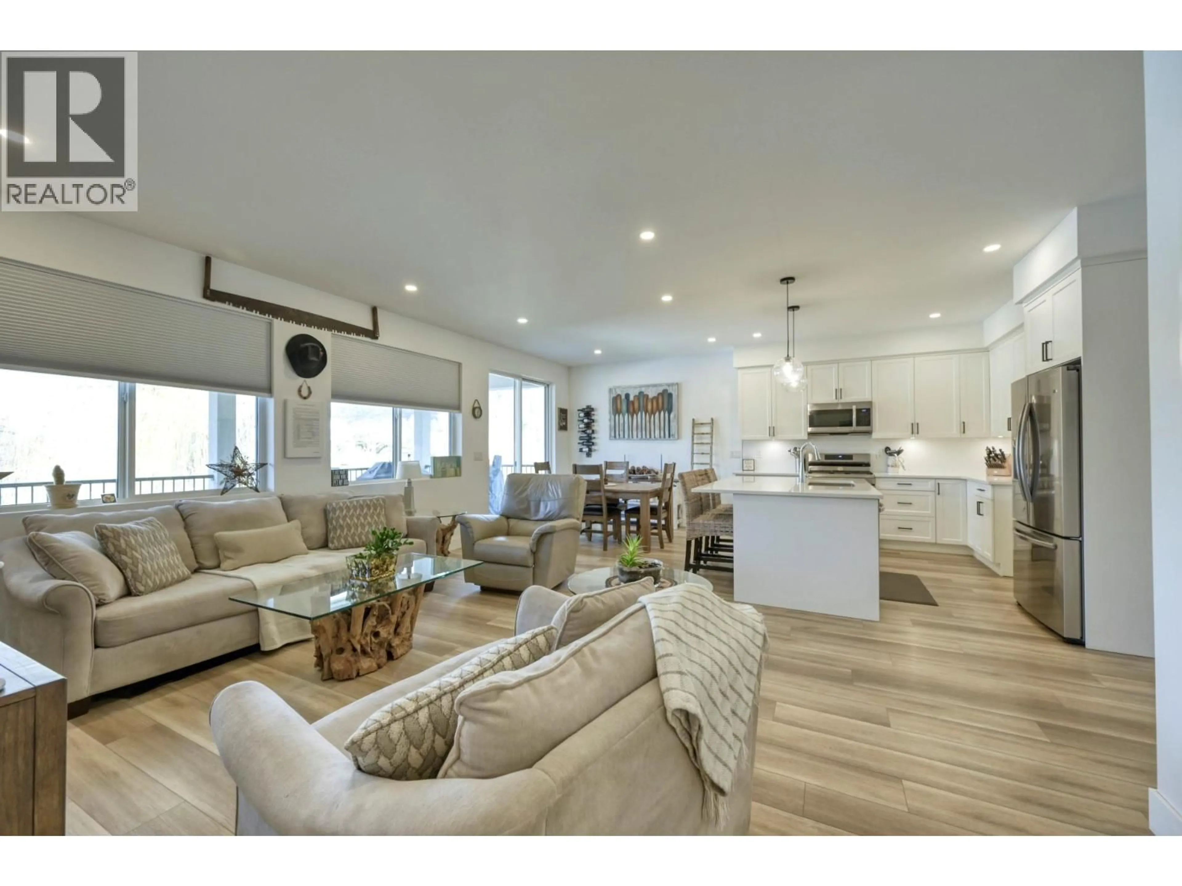 Open concept kitchen, wood/laminate floor for 14 LAMBERT COURT, Osoyoos British Columbia V0H1V1