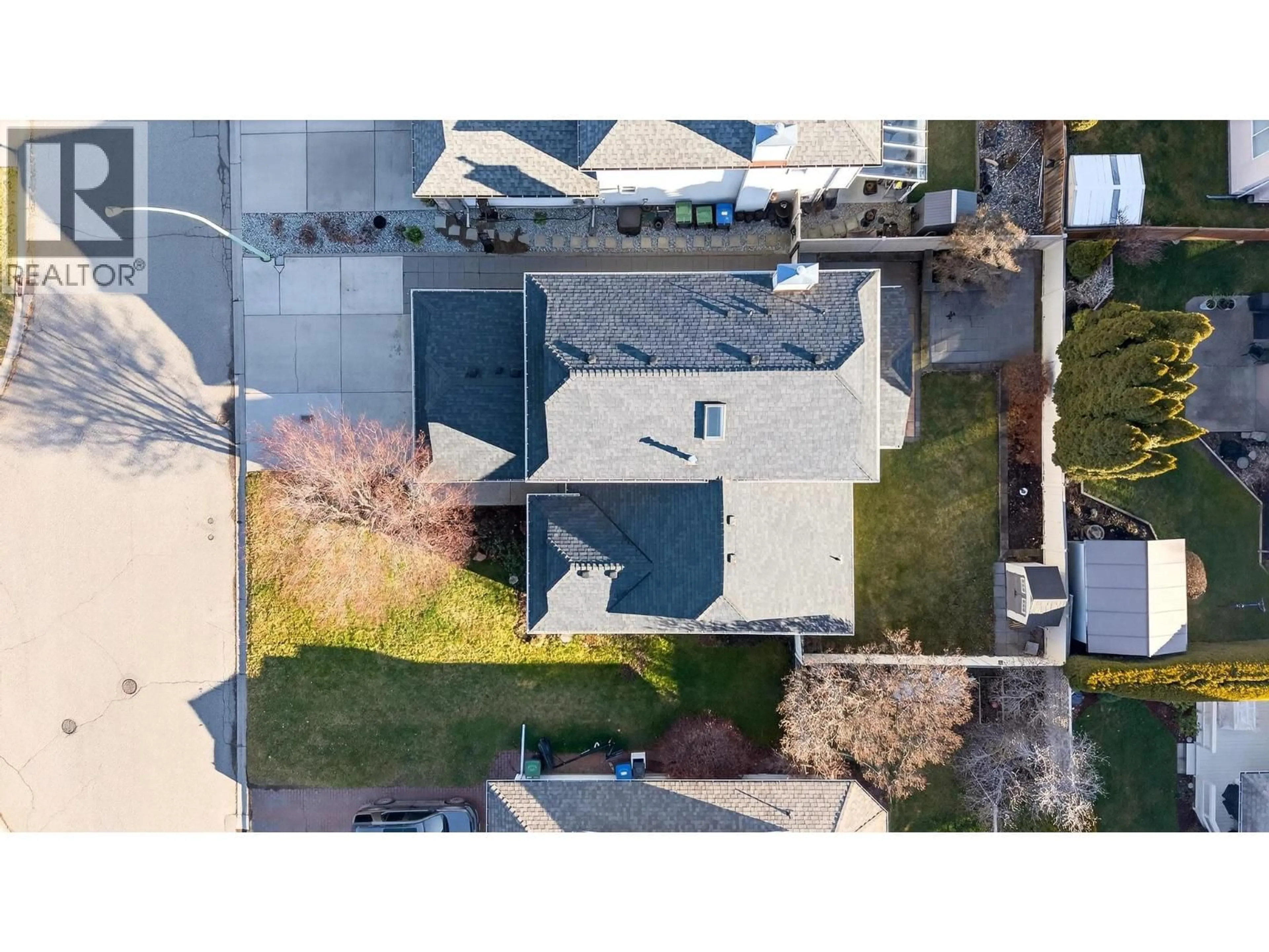 A pic from outside/outdoor area/front of a property/back of a property/a pic from drone, street for 1005 WINTERGREEN DRIVE, Kelowna British Columbia V1W3V7
