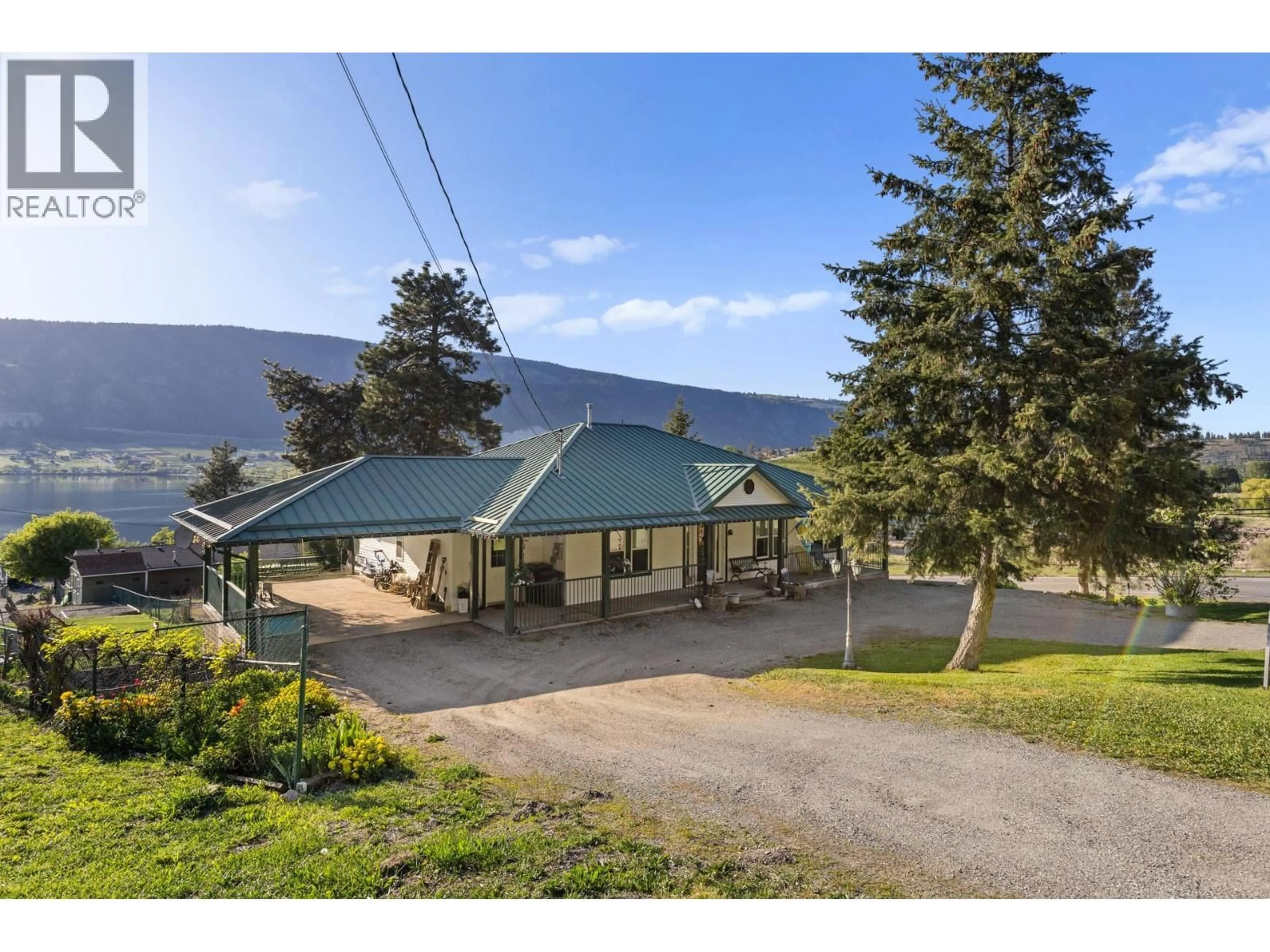 A pic from outside/outdoor area/front of a property/back of a property/a pic from drone, mountain view for 15326 OYAMA ROAD, Lake Country British Columbia V4V2C5