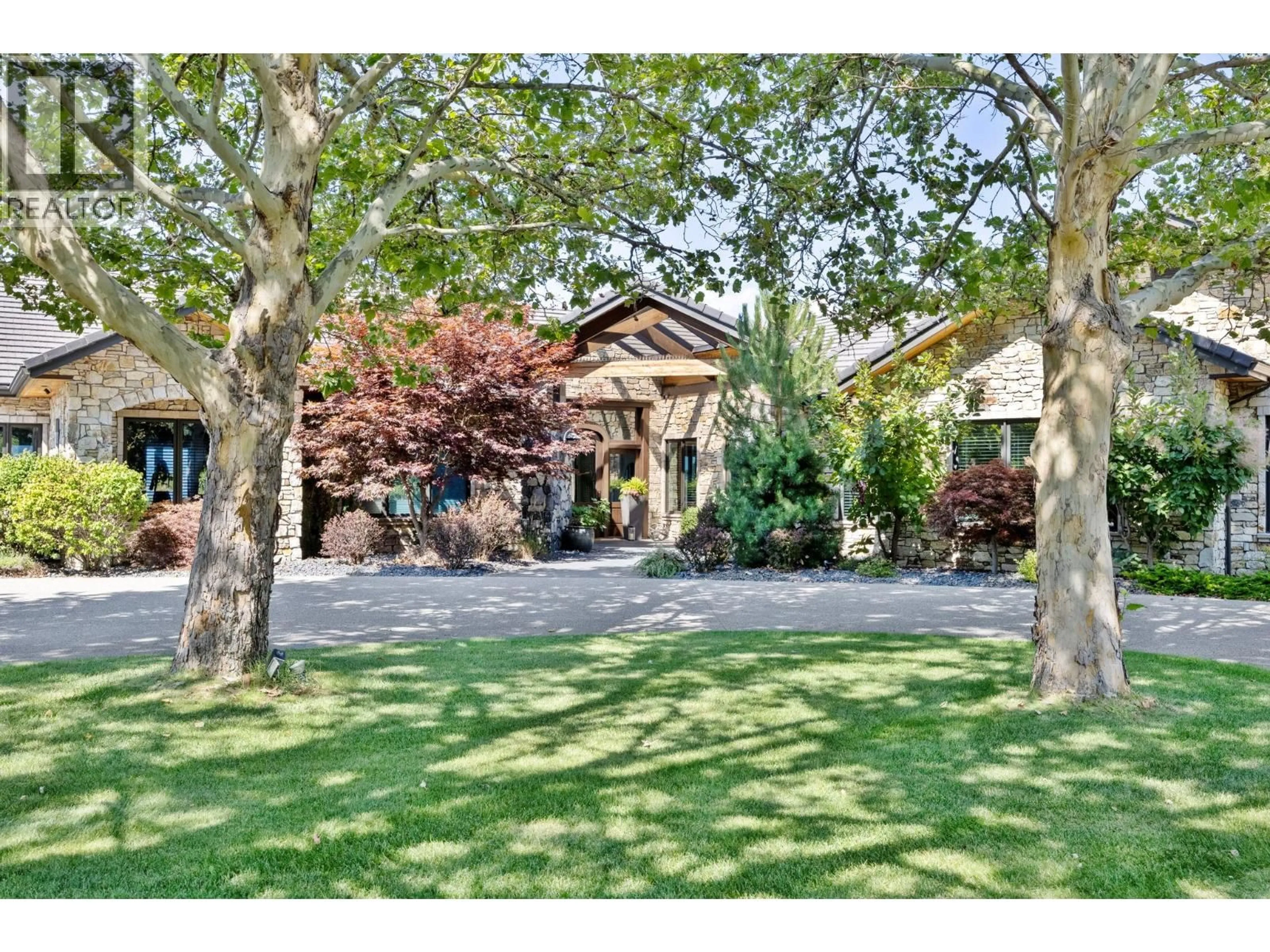 A pic from outside/outdoor area/front of a property/back of a property/a pic from drone, street for 4040 CASORSO ROAD, Kelowna British Columbia V1W4N6