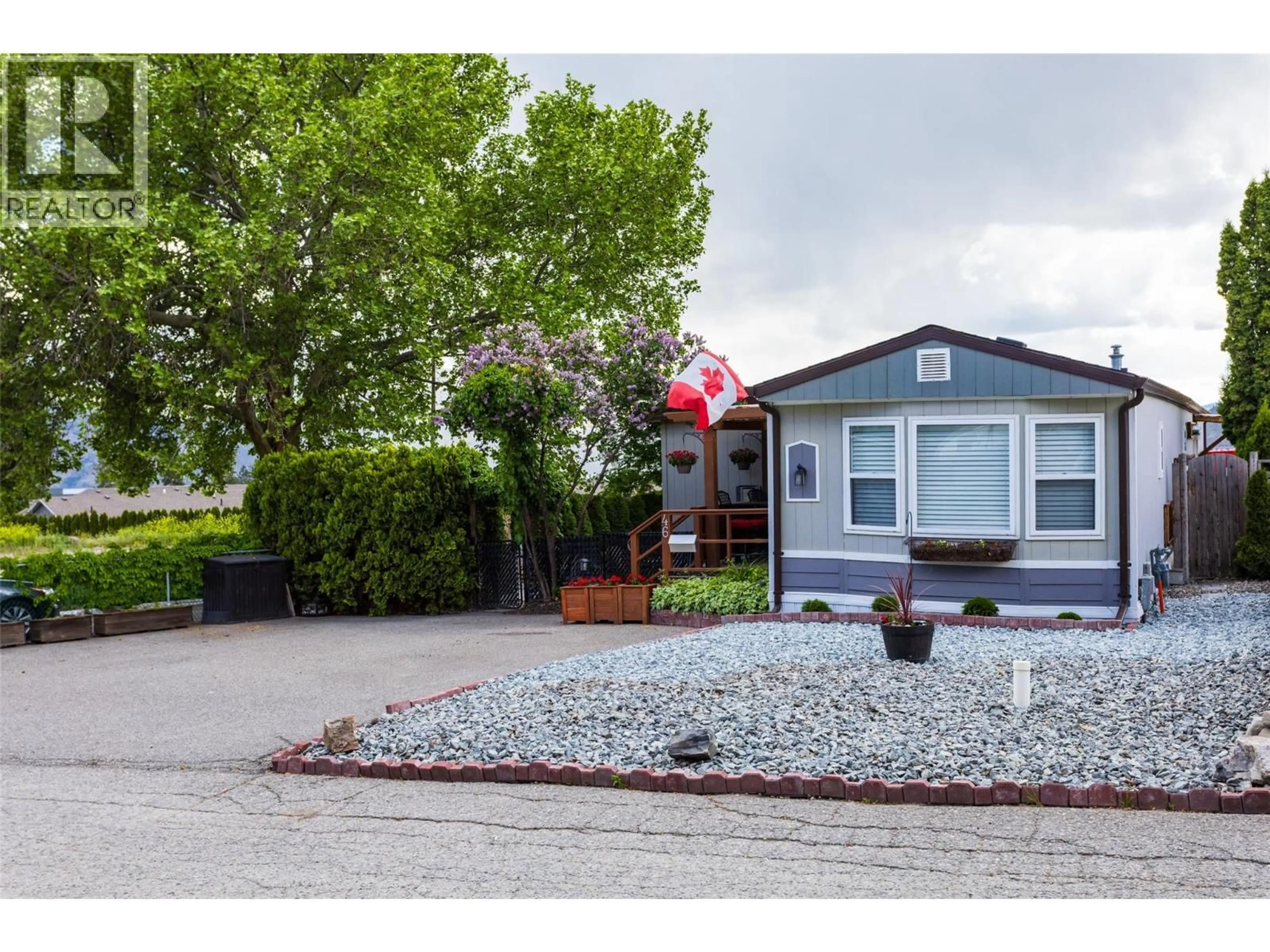 Home with vinyl exterior material, street for 46 - 2001 97 S HIGHWAY, West Kelowna British Columbia V1Z3M8