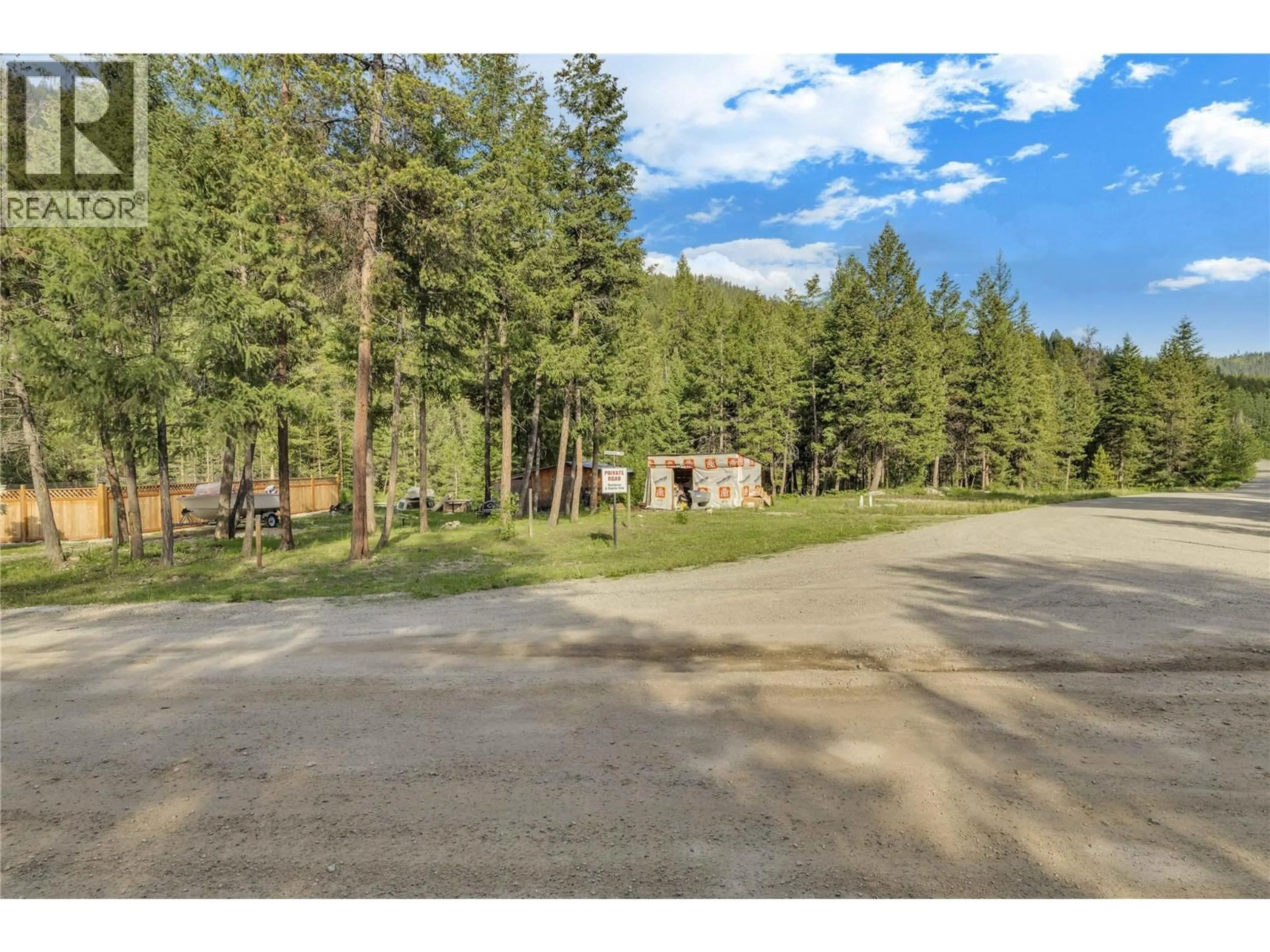 A pic from outside/outdoor area/front of a property/back of a property/a pic from drone, forest/trees view for 30 BOULDER ROAD, Beaverdell British Columbia V0H1A0