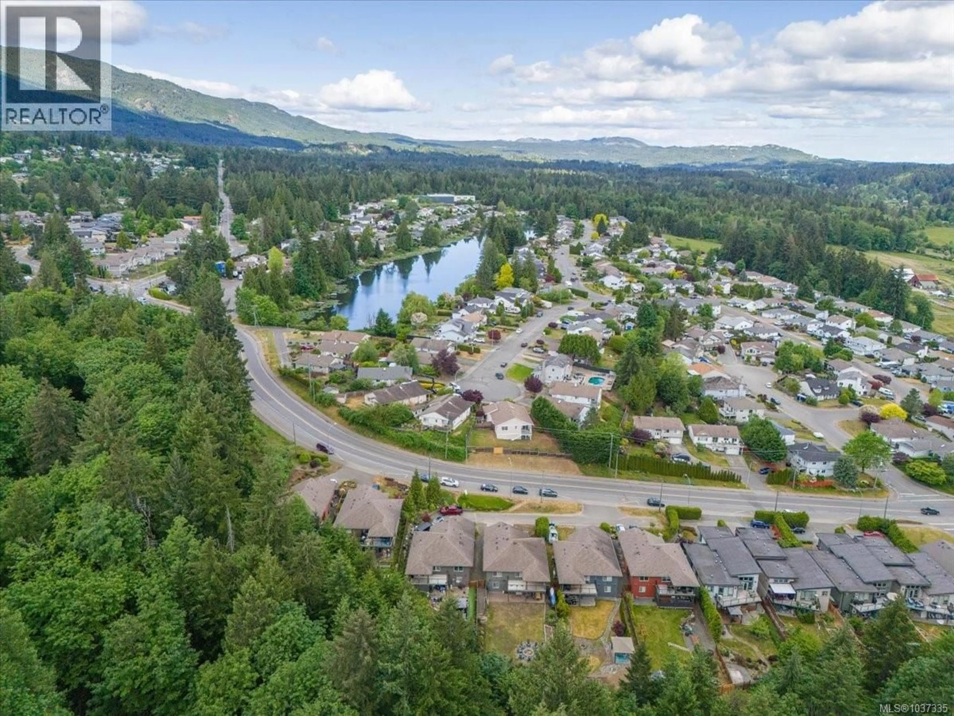 A pic from outside/outdoor area/front of a property/back of a property/a pic from drone, mountain view for 220 WESTWOOD ROAD, Nanaimo British Columbia V9R6S3