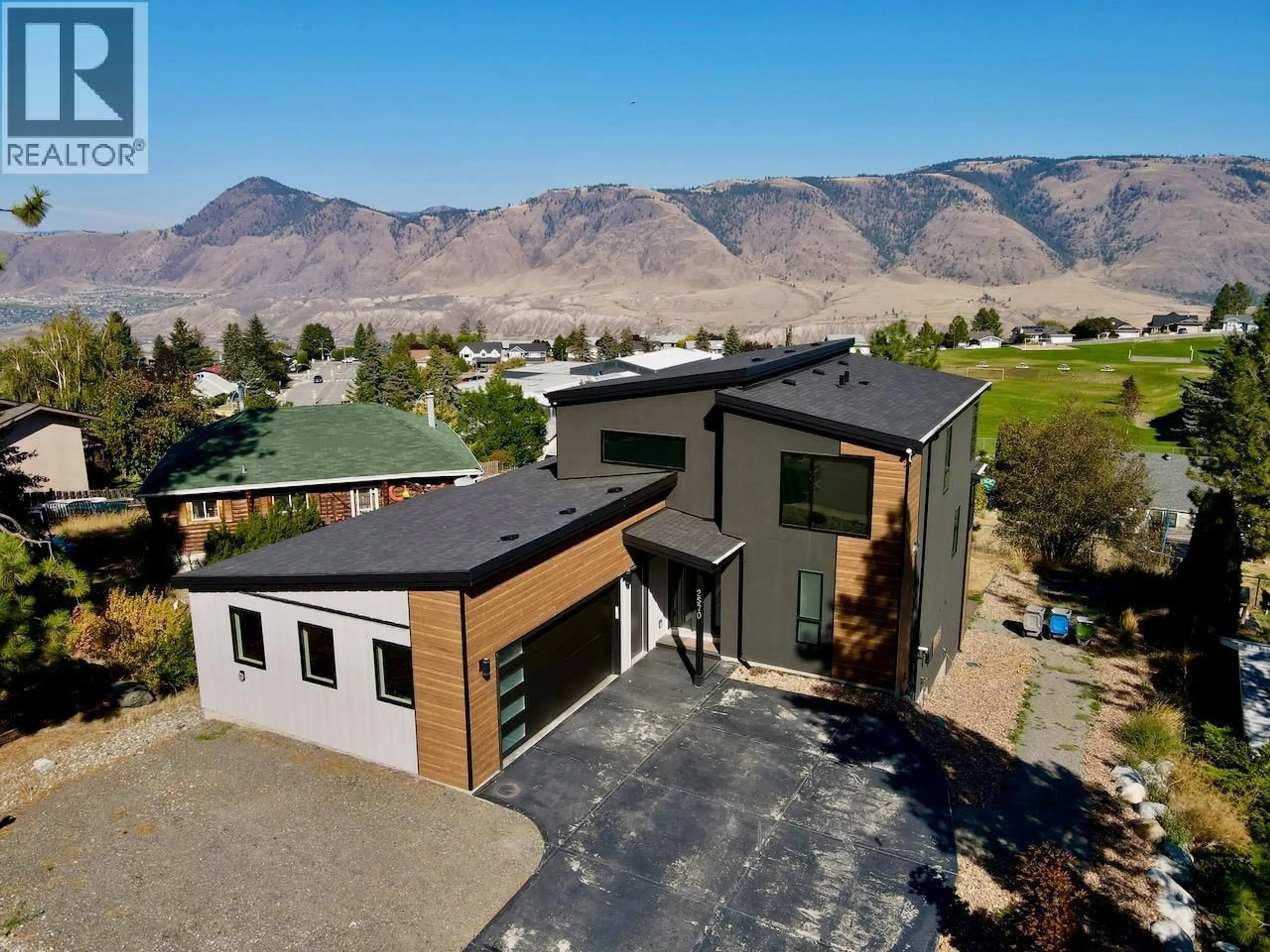 A pic from outside/outdoor area/front of a property/back of a property/a pic from drone, mountain view for 2570 SKEENA DR. DRIVE, Kamloops British Columbia V2E1V5