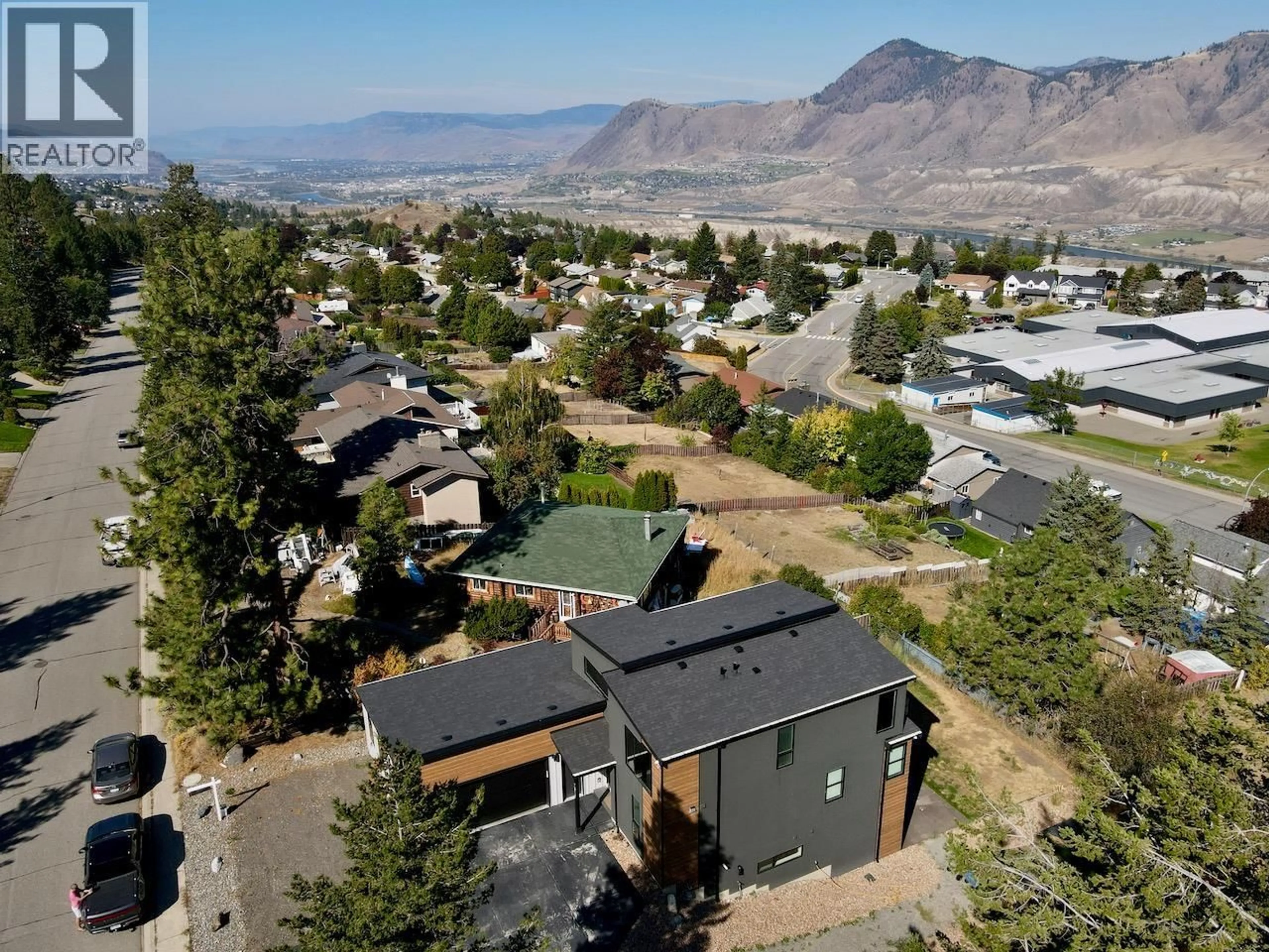 A pic from outside/outdoor area/front of a property/back of a property/a pic from drone, mountain view for 2570 SKEENA DR. DRIVE, Kamloops British Columbia V2E1V5
