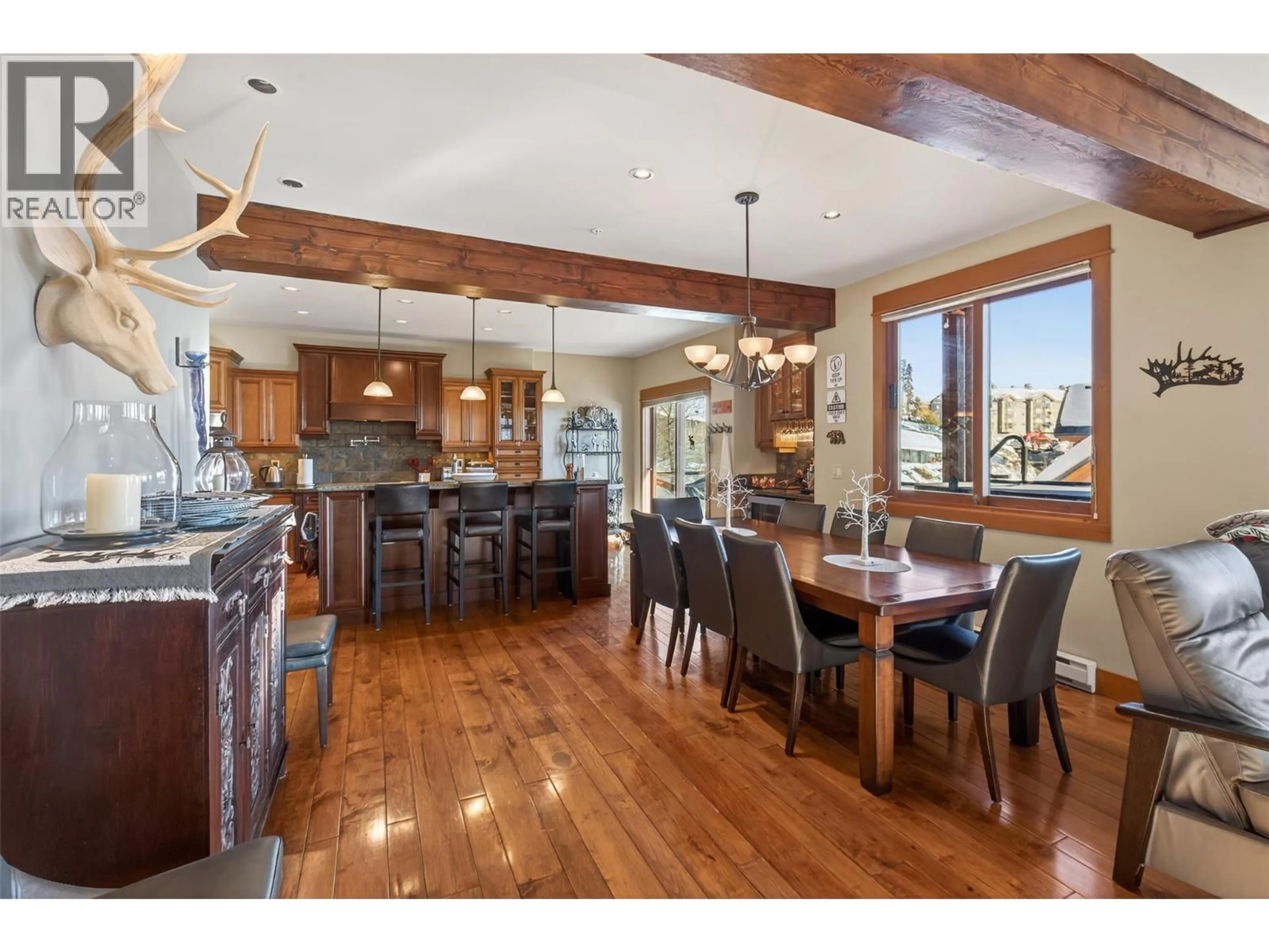 Open concept kitchen, wood/laminate floor for 10 - 80 KETTLEVIEW ROAD, Big White British Columbia V1P1P3