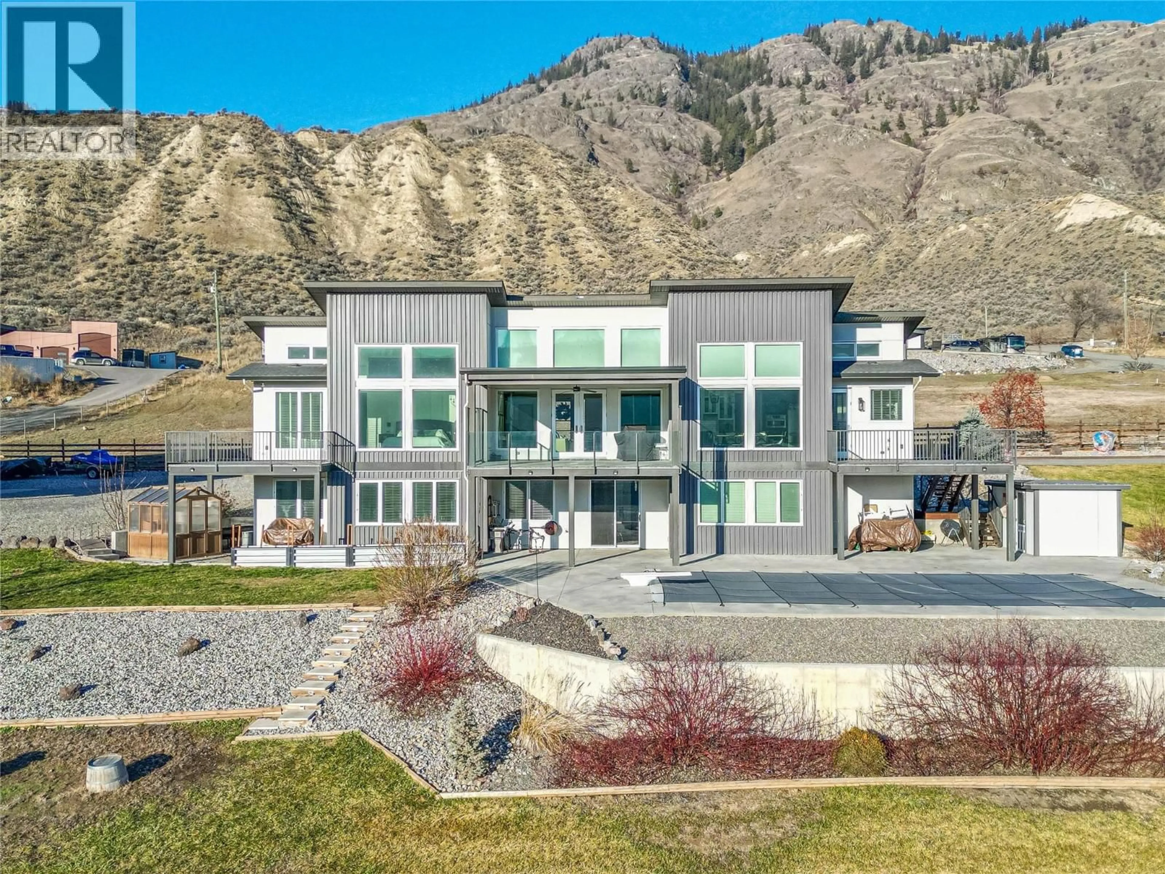 A pic from outside/outdoor area/front of a property/back of a property/a pic from drone, mountain view for 3093 SHUSWAP  E ROAD, Kamloops British Columbia V2H1T1