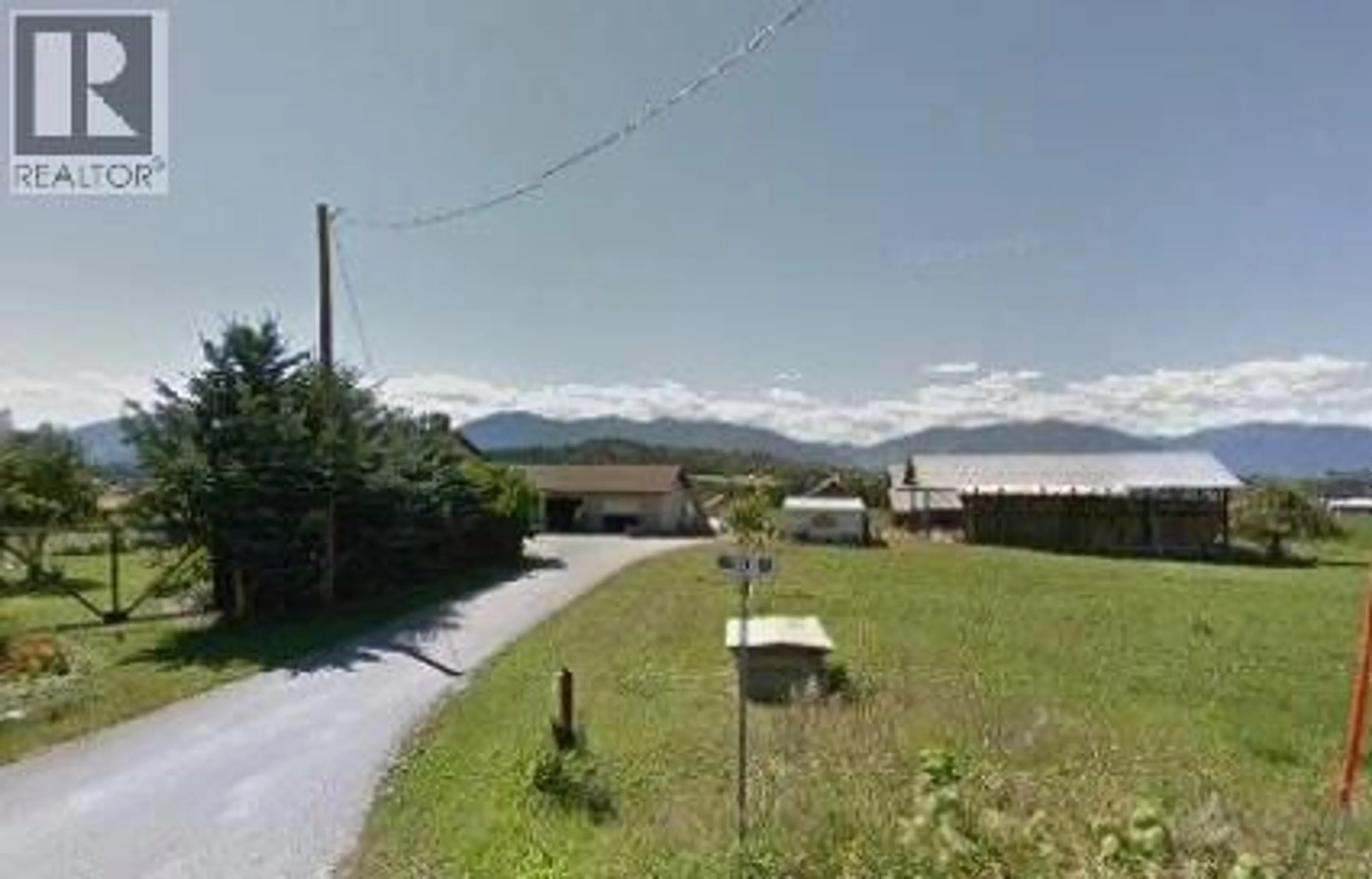 A pic from outside/outdoor area/front of a property/back of a property/a pic from drone, mountain view for 3621 MUZZY ROAD, Canyon British Columbia V0B1C1