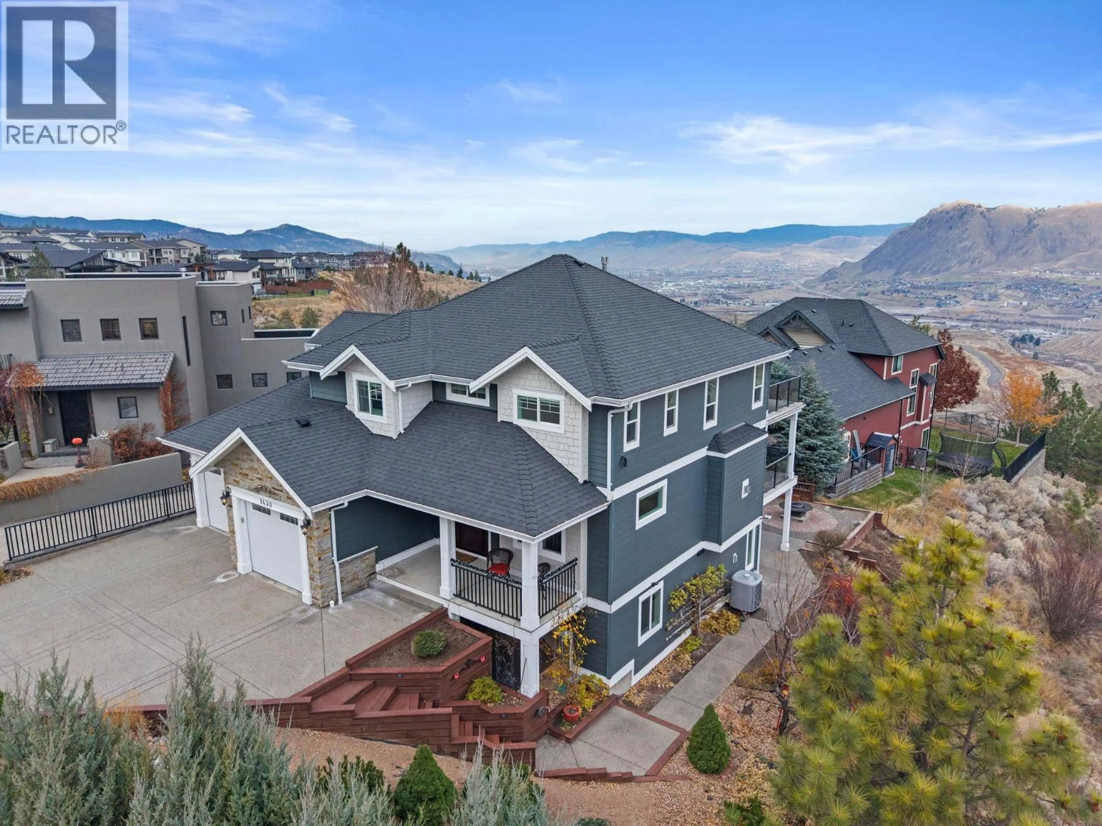 A pic from outside/outdoor area/front of a property/back of a property/a pic from drone, mountain view for 1430 KECHIKA COURT, Kamloops British Columbia V2E2T5