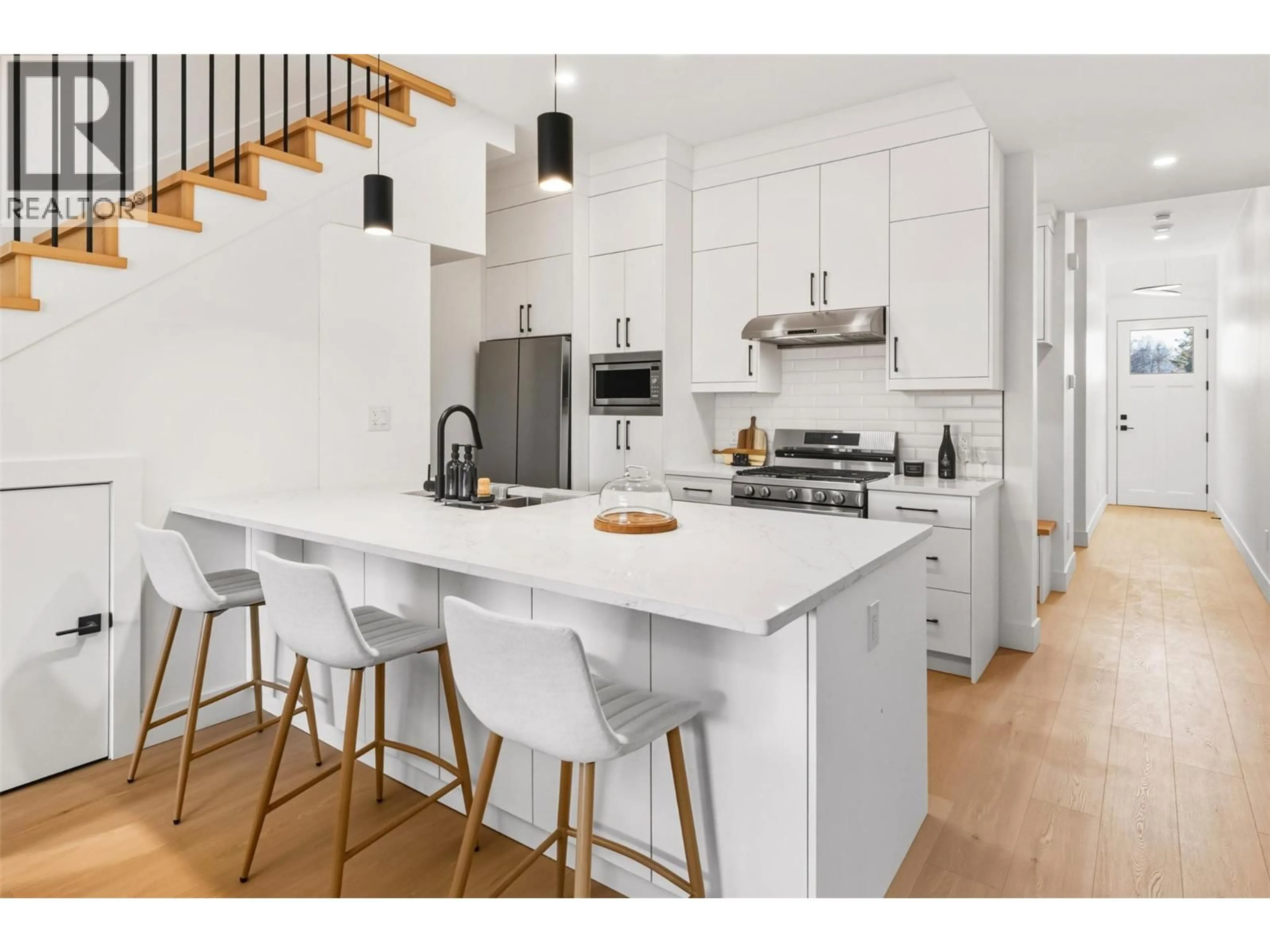 Open concept kitchen, wood/laminate floor for 2 - 194 MAPLE PLACE, Oliver British Columbia V0H1T9