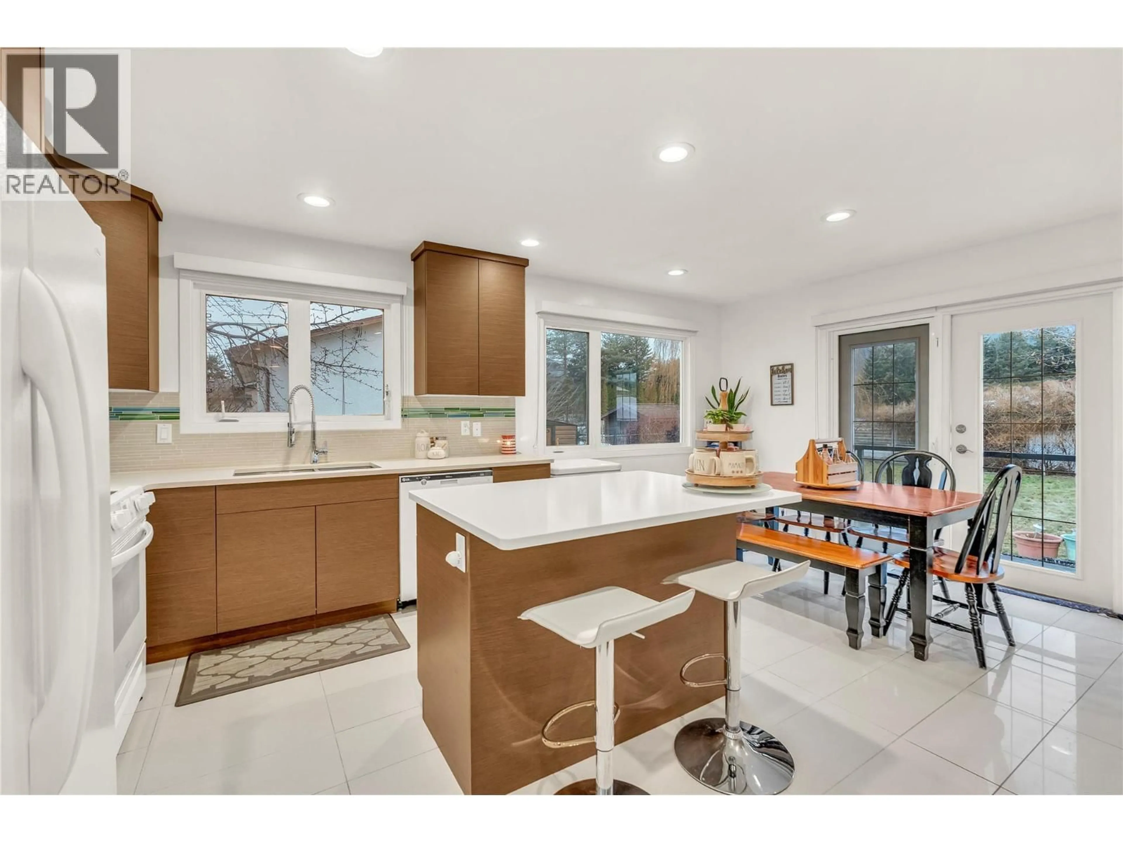 Open concept kitchen, ceramic/tile floor for 10721 JULIA STREET, Summerland British Columbia V0H1Z5