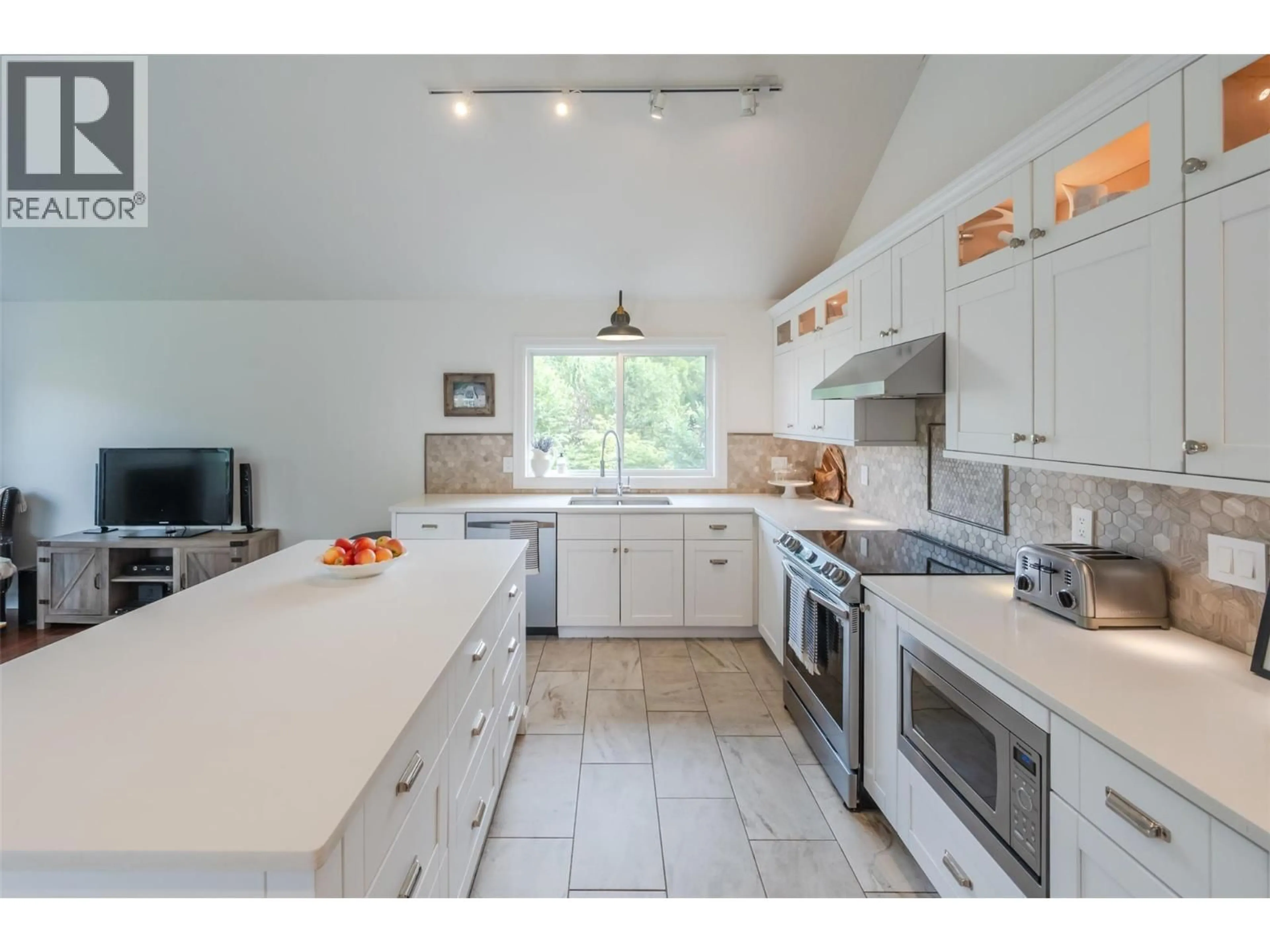 Open concept kitchen, ceramic/tile floor for 6107 TAVENDER COURT, Summerland British Columbia V0H1Z7