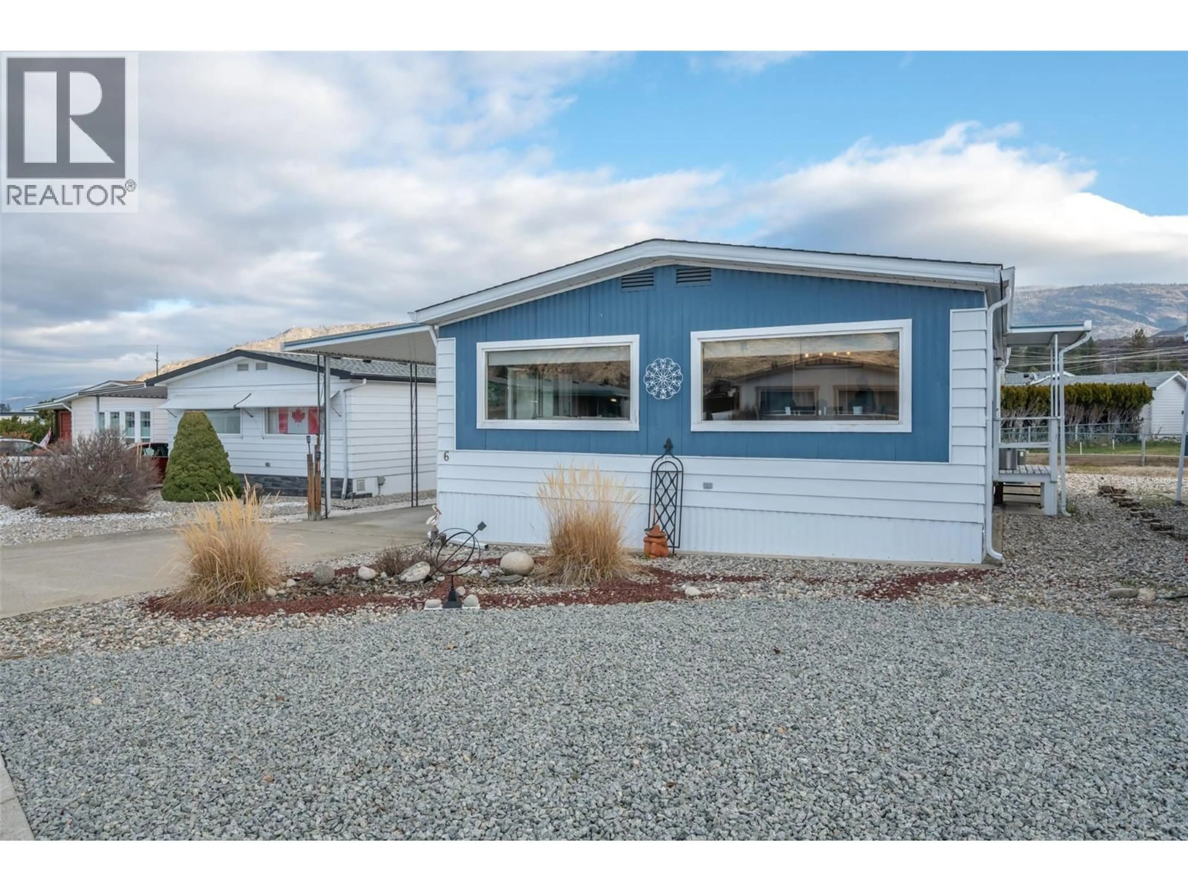 Home with vinyl exterior material, street for 6 - 6601 TUCELNUIT DRIVE, Oliver British Columbia V0H1T3