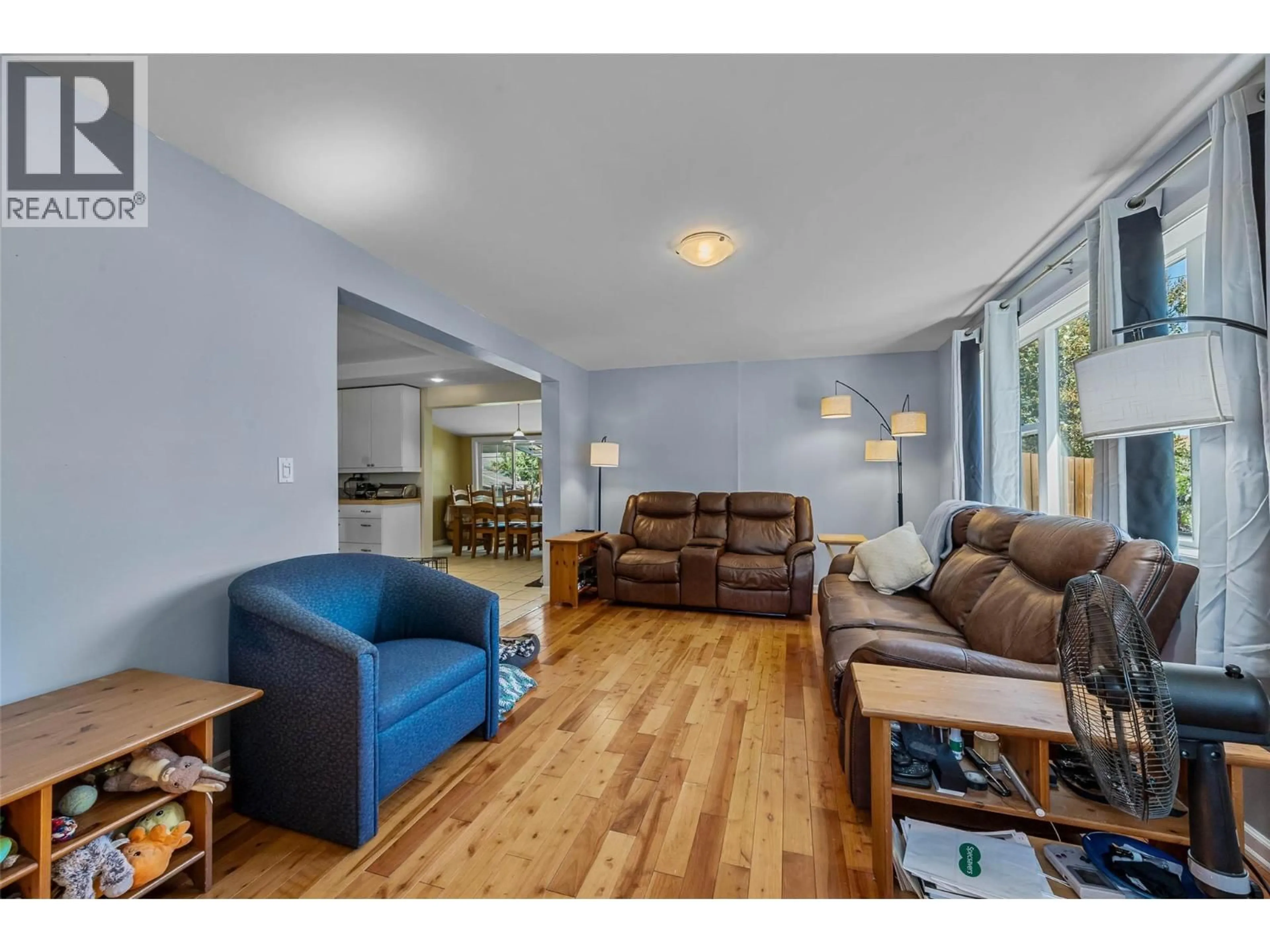 Living room with furniture, wood/laminate floor for 755 CRESTLINE STREET, Kamloops British Columbia V2B5X2