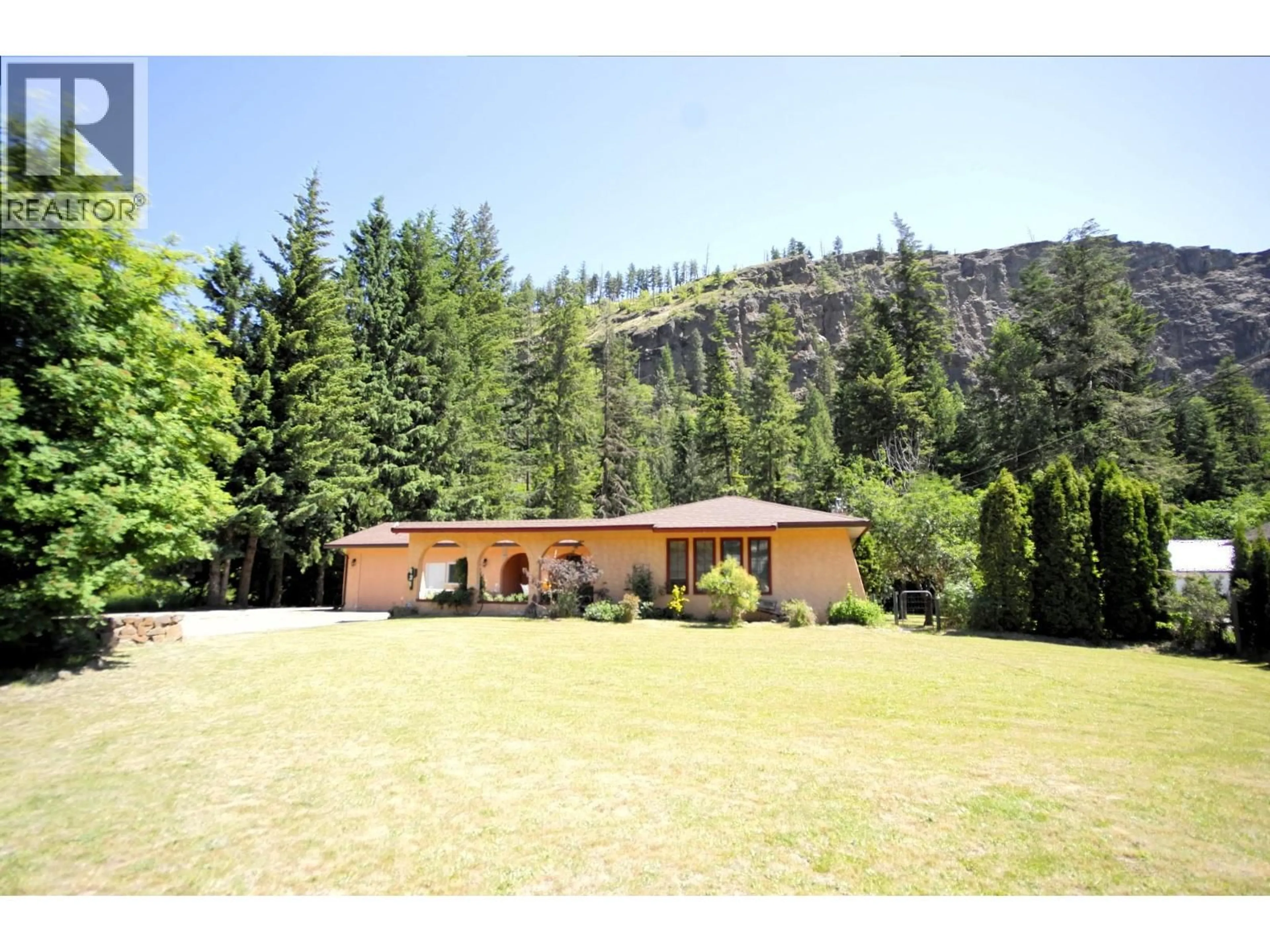 A pic from outside/outdoor area/front of a property/back of a property/a pic from drone, mountain view for 131 SALMON RIVER ROAD, Salmon Arm British Columbia V1E3E3