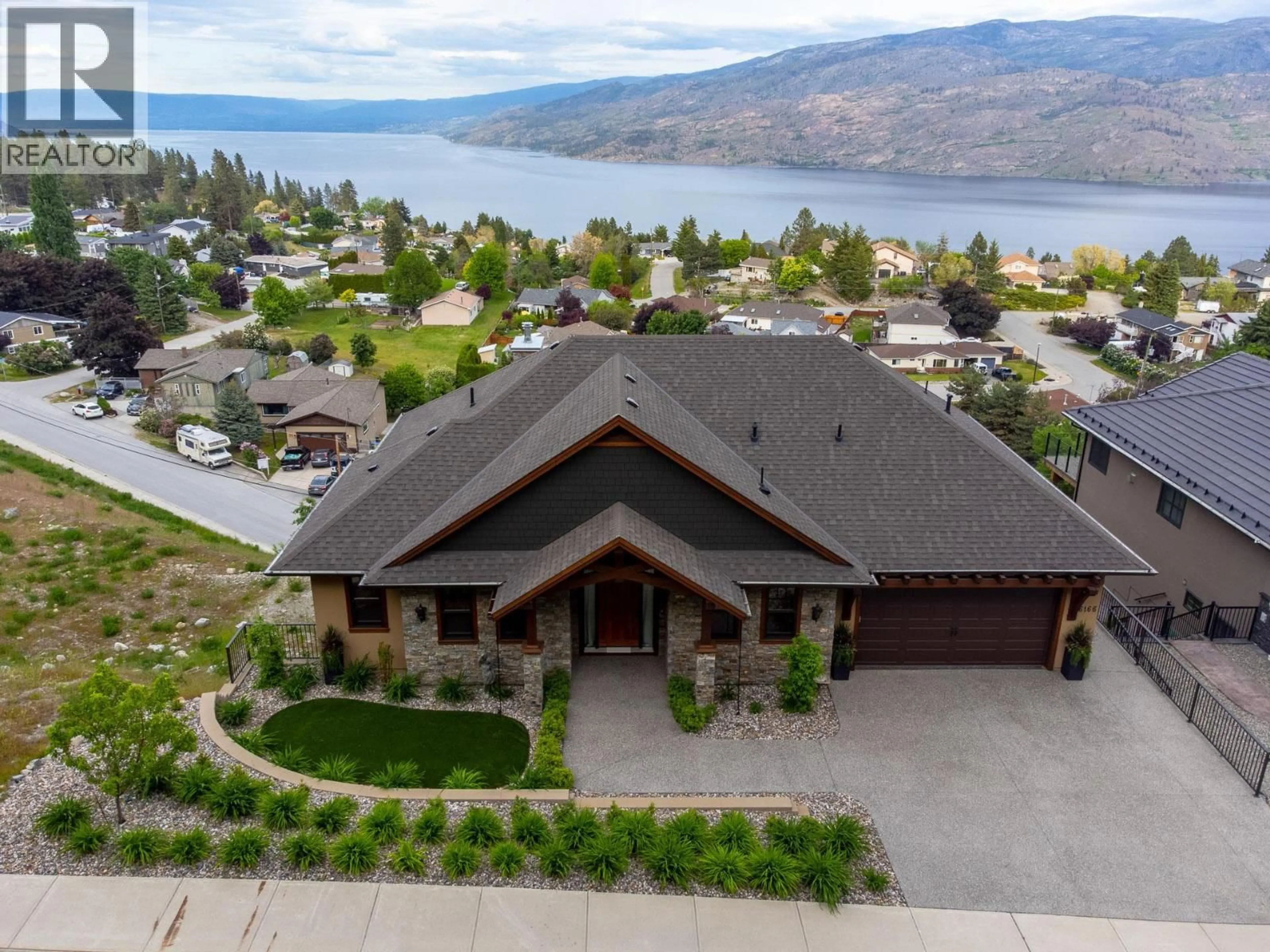 A pic from outside/outdoor area/front of a property/back of a property/a pic from drone, water/lake/river/ocean view for 6166 SEYMOURE AVENUE, Peachland British Columbia V0H1X4