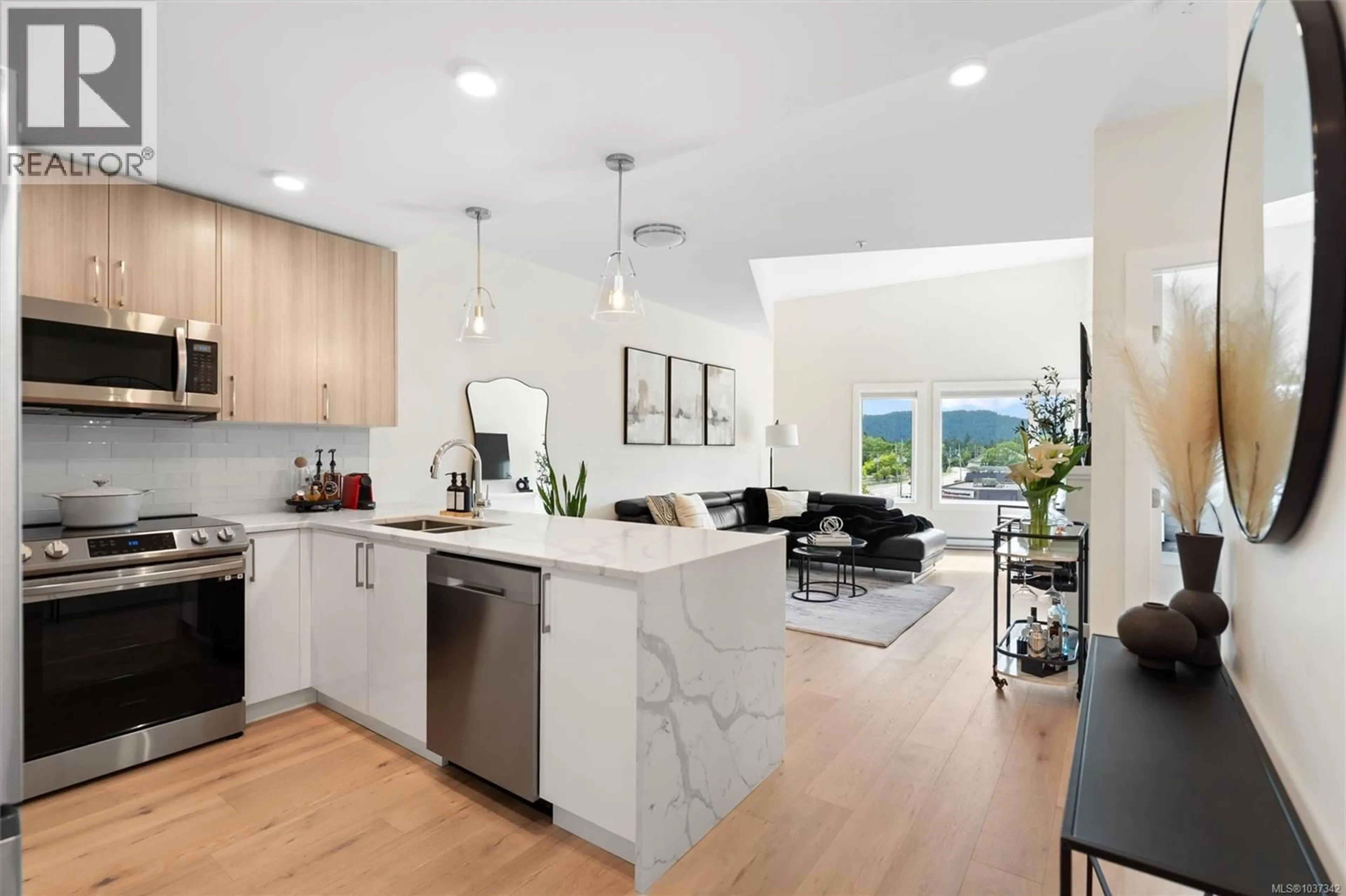 Open concept kitchen, unknown for 404 - 7098 WALLACE DRIVE, Central Saanich British Columbia V8M1N5