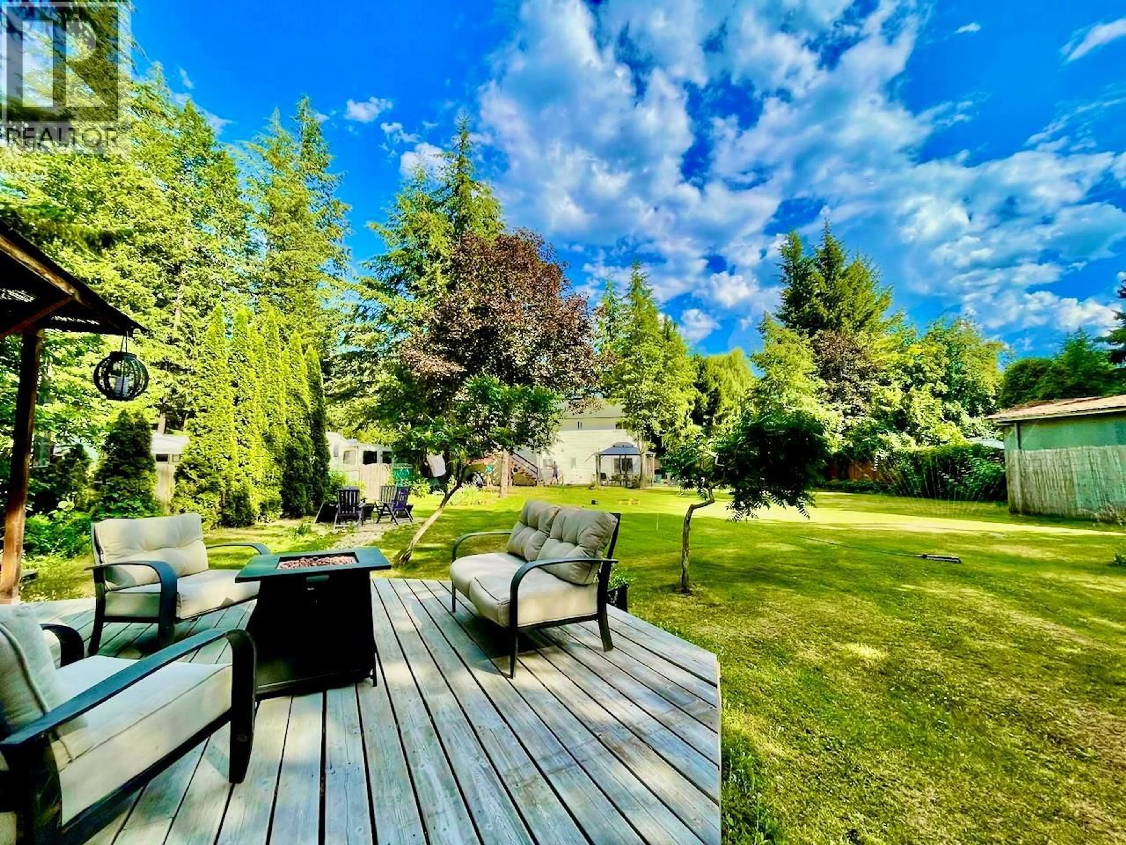 A pic from outside/outdoor area/front of a property/back of a property/a pic from drone, forest/trees view for 4179 ASHE CRESCENT, Scotch Creek British Columbia V0E1M5