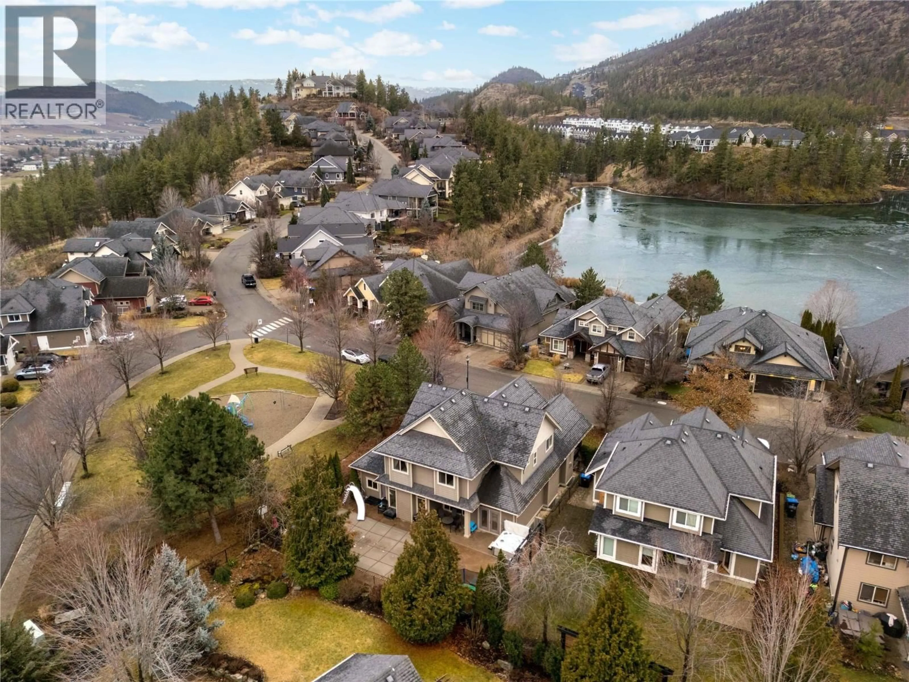 A pic from outside/outdoor area/front of a property/back of a property/a pic from drone, water/lake/river/ocean view for 1959 HIDDEN LAKE PLACE, Kelowna British Columbia V1V2W8