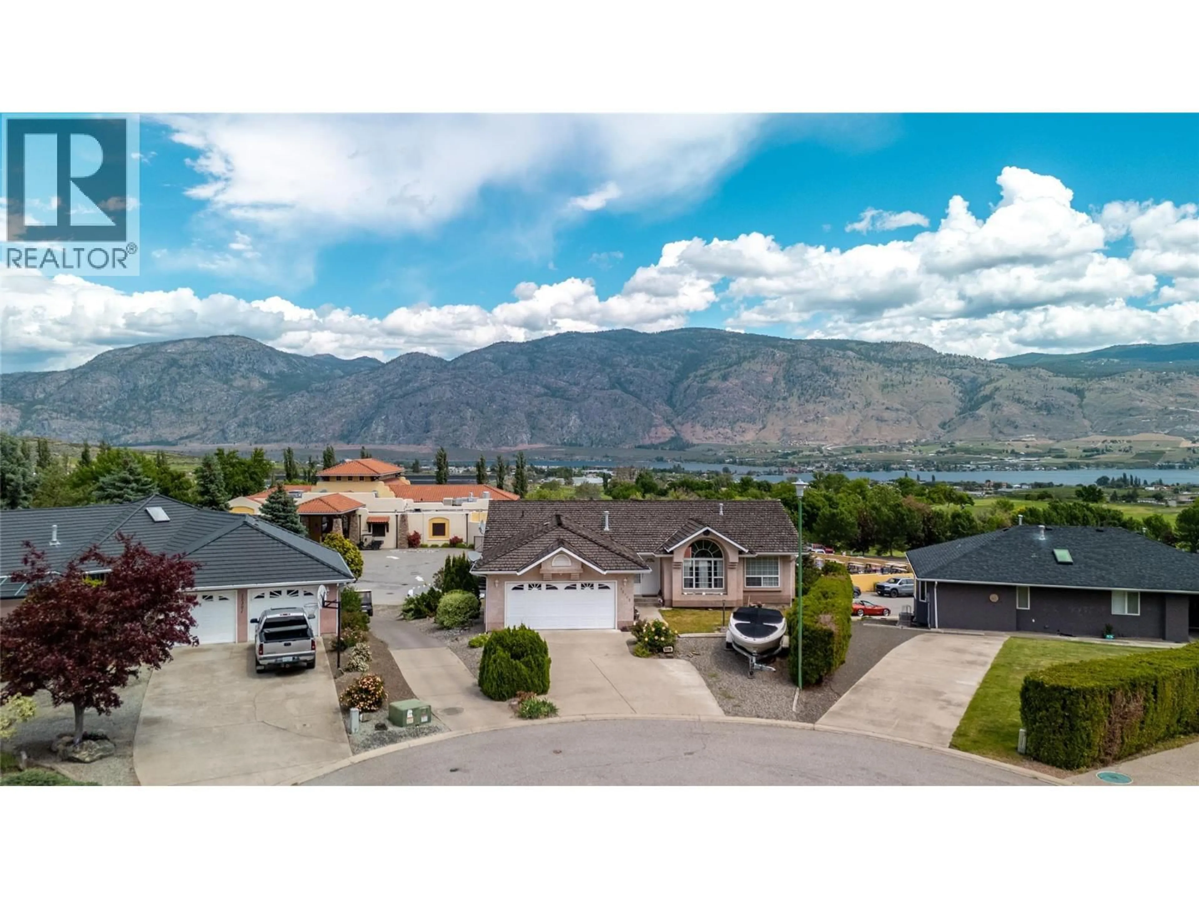A pic from outside/outdoor area/front of a property/back of a property/a pic from drone, mountain view for 12113 GLEN ABBEY COURT, Osoyoos British Columbia V0H1V4