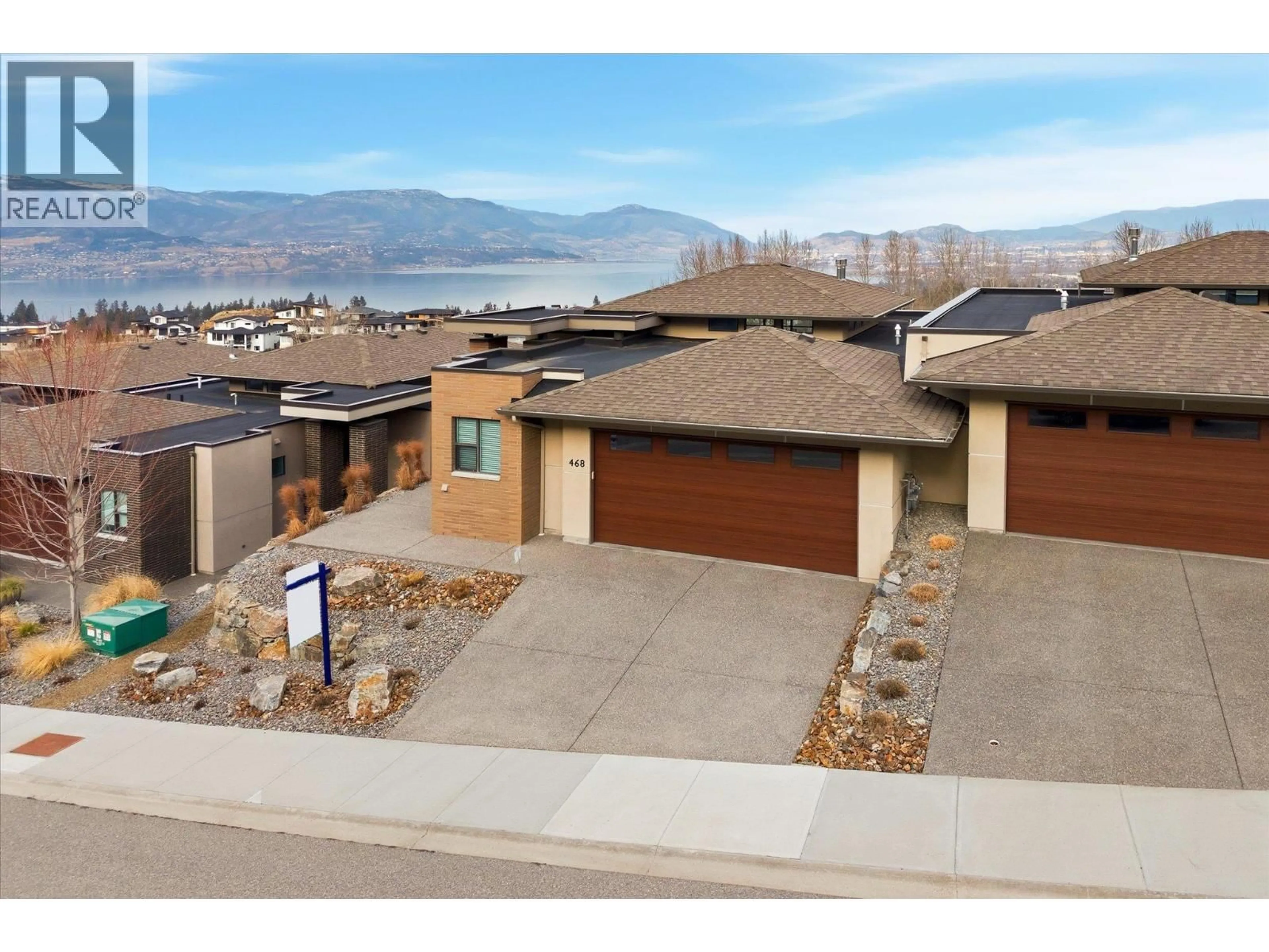 A pic from outside/outdoor area/front of a property/back of a property/a pic from drone, mountain view for 468 SPARROW HAWK COURT, Kelowna British Columbia V1W0A6