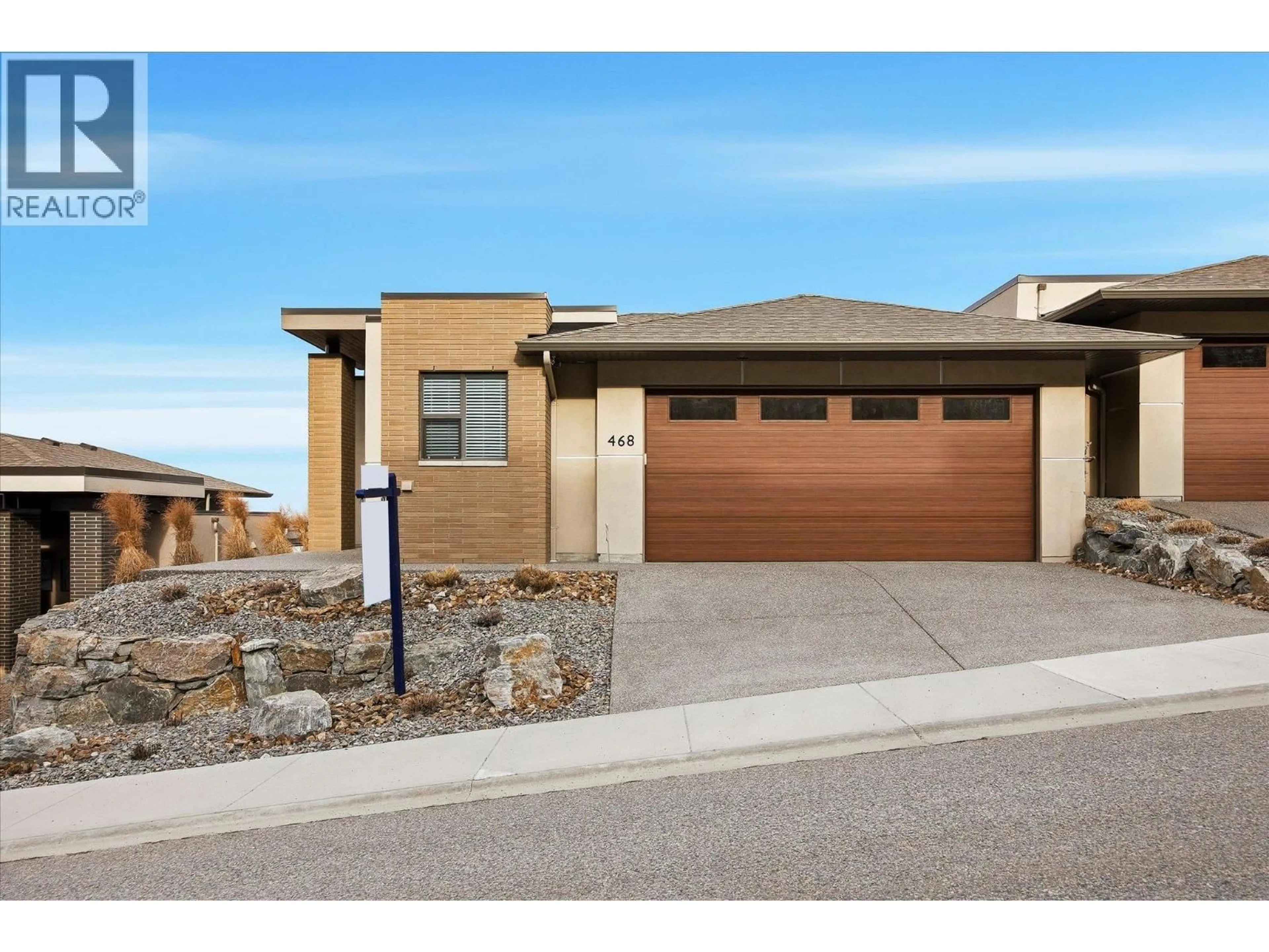 Home with brick exterior material, street for 468 SPARROW HAWK COURT, Kelowna British Columbia V1W0A6