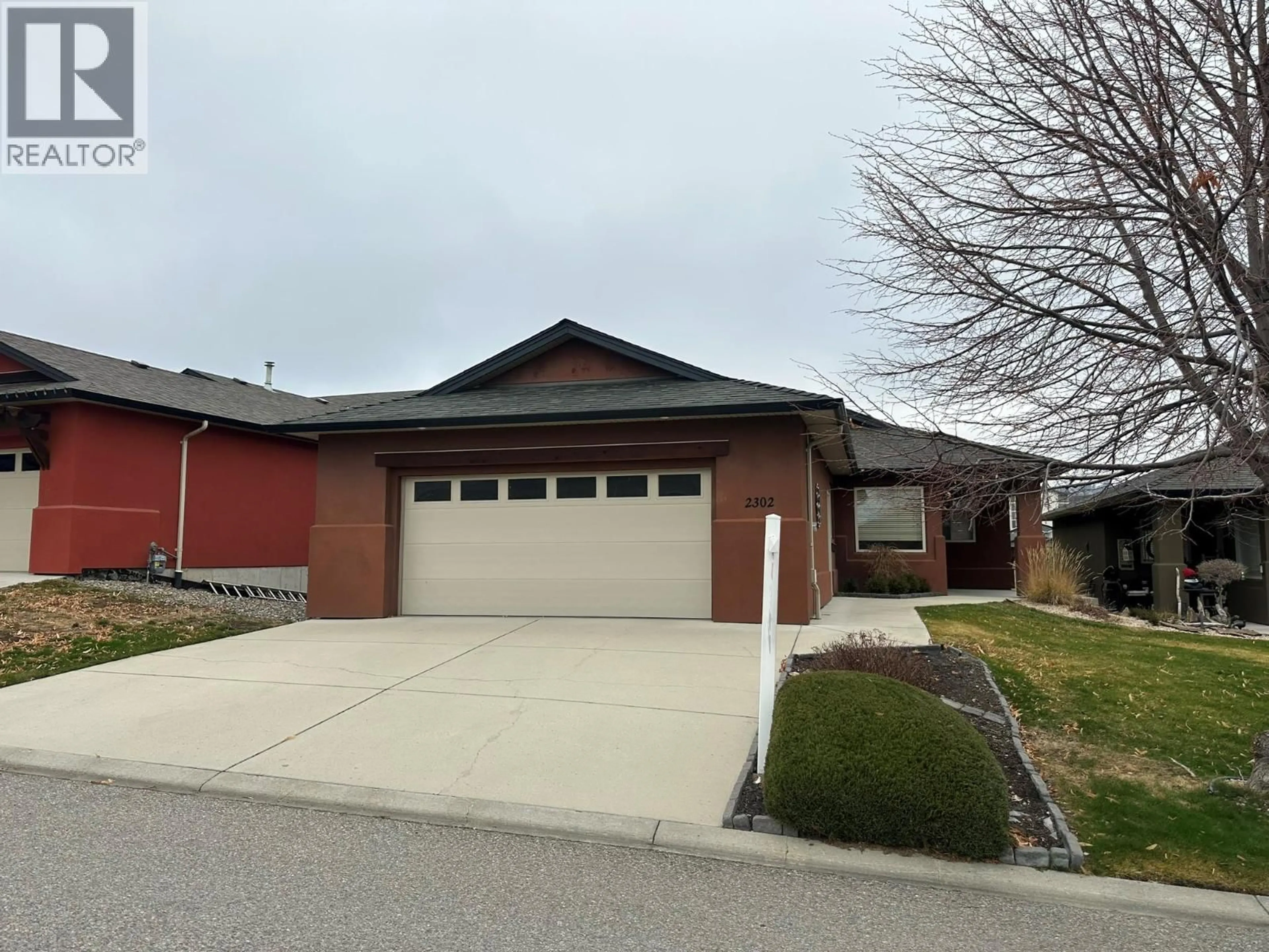 Home with brick exterior material, street for 2302 PINE VISTA PLACE, West Kelowna British Columbia V4T2Y1