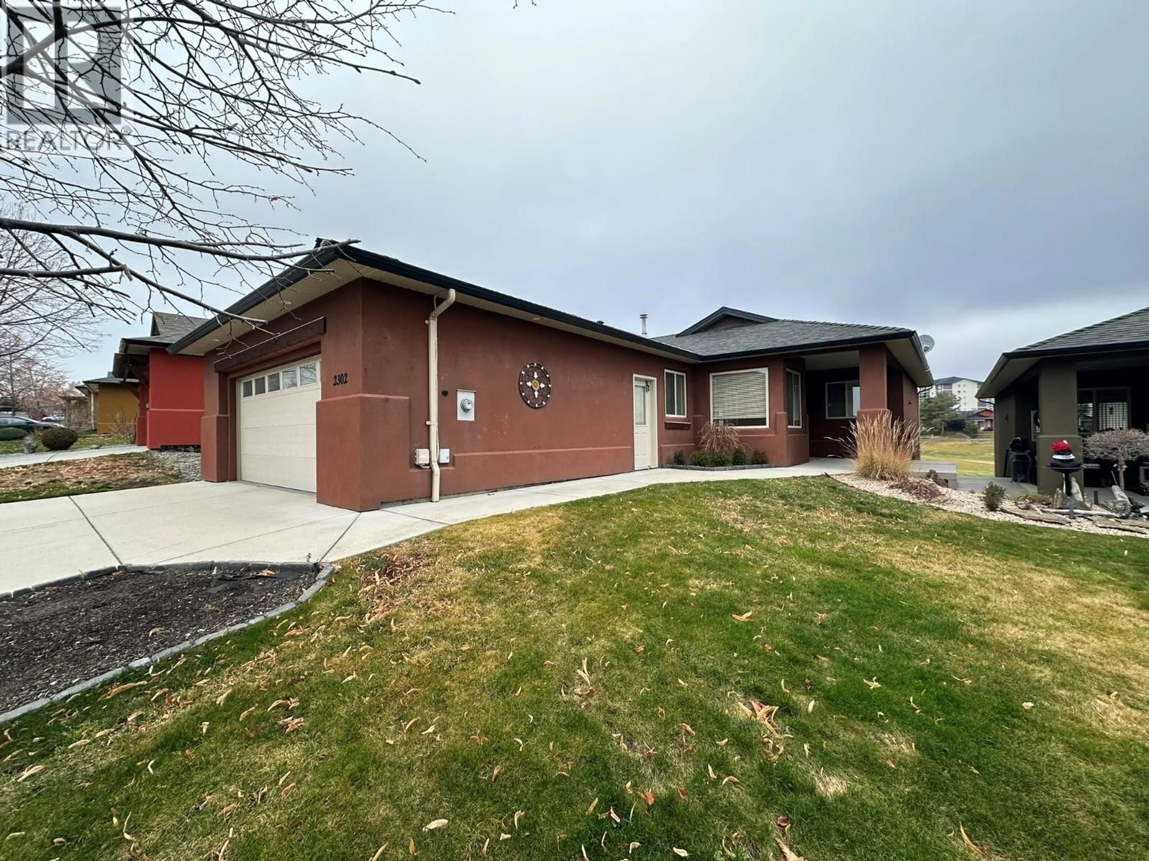 Home with brick exterior material, street for 2302 PINE VISTA PLACE, West Kelowna British Columbia V4T2Y1