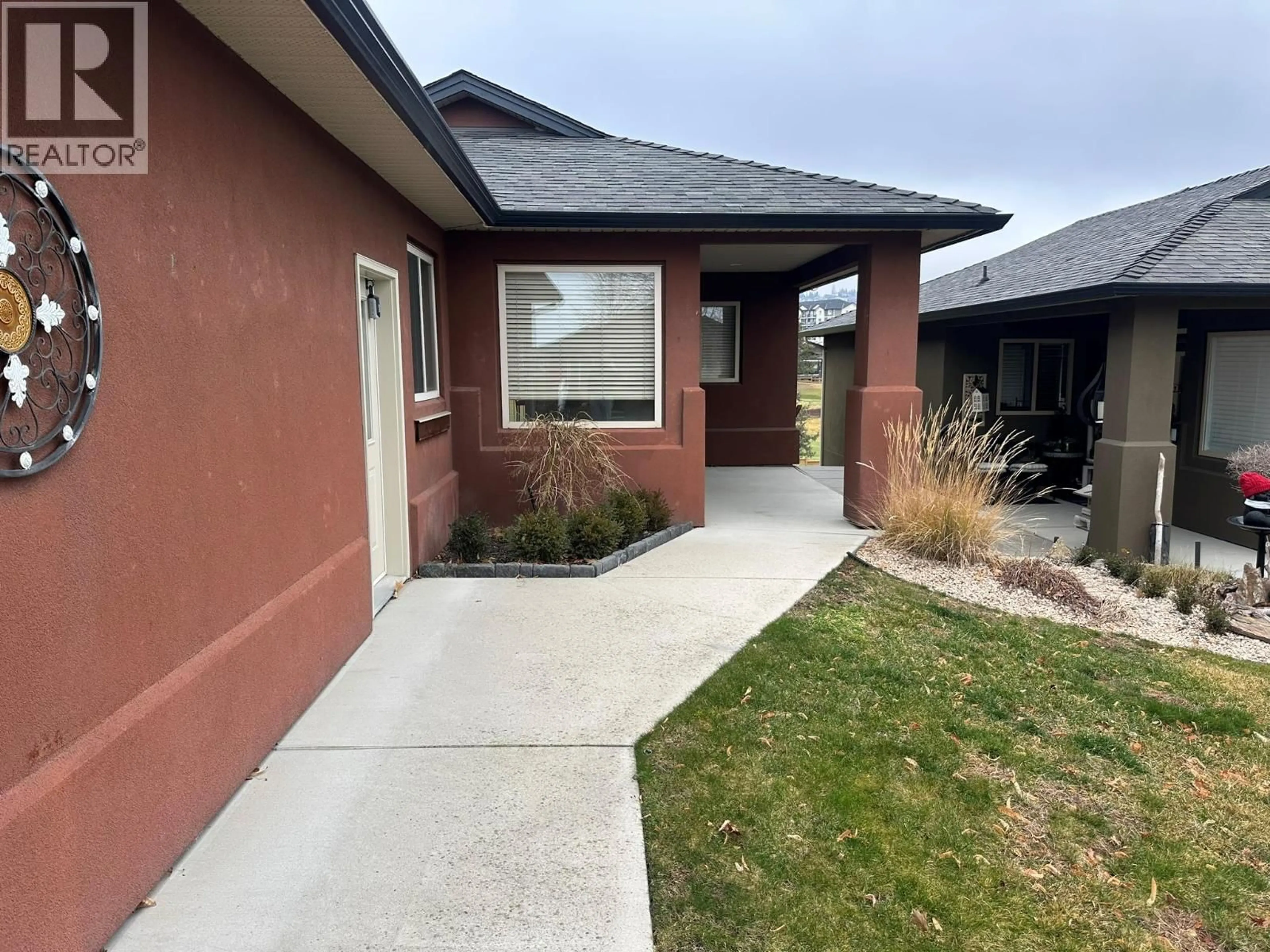 Home with brick exterior material, street for 2302 PINE VISTA PLACE, West Kelowna British Columbia V4T2Y1