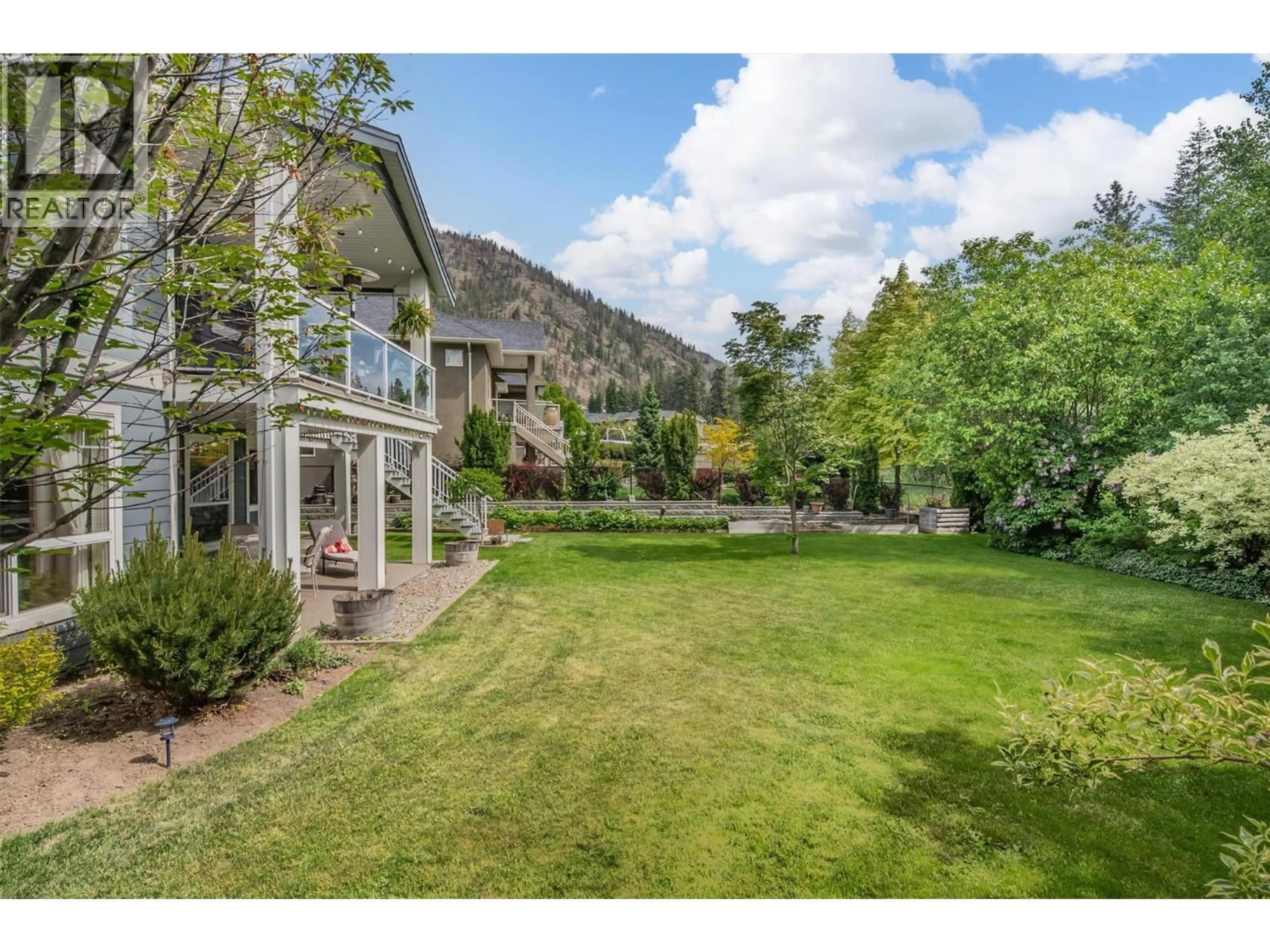 A pic from outside/outdoor area/front of a property/back of a property/a pic from drone, mountain view for 2423 PARAMOUNT DRIVE, West Kelowna British Columbia V4T3K4