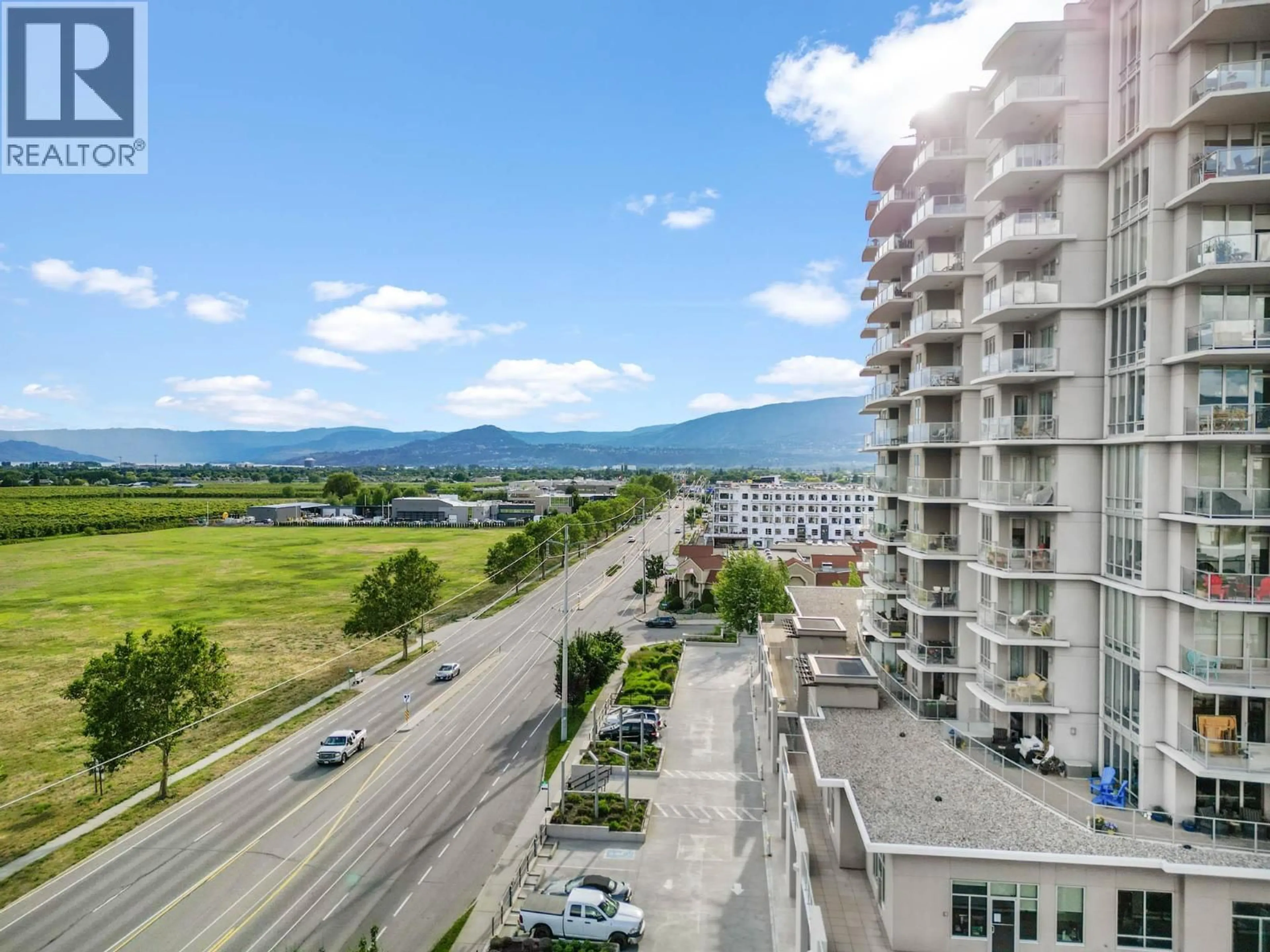 A pic from outside/outdoor area/front of a property/back of a property/a pic from drone, city buildings view from balcony for 201 - 2040 SPRINGFIELD ROAD, Kelowna British Columbia V1Y9N7