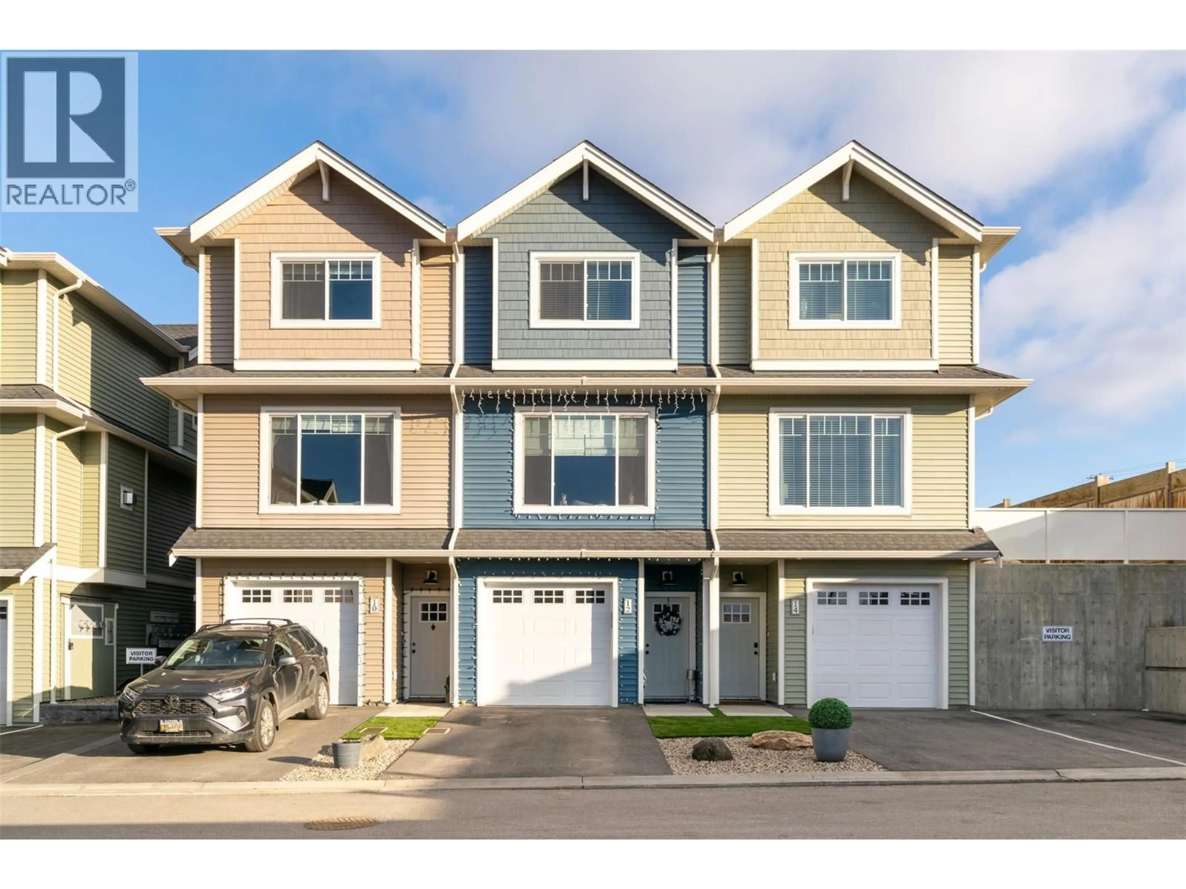 Home with vinyl exterior material, street for 14 - 1910 11 AVENUE NORTHEAST, Salmon Arm British Columbia V1E2V5