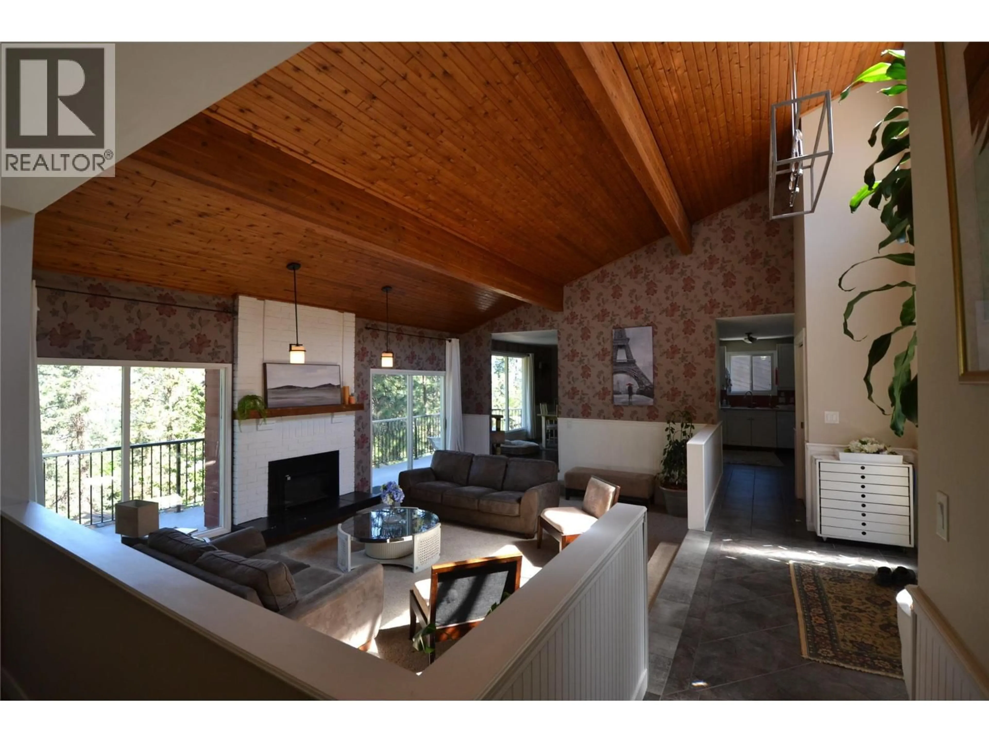 Living room with furniture, wood/laminate floor for 2172 MICHELLE CRESCENT, West Kelowna British Columbia V1Z3B6