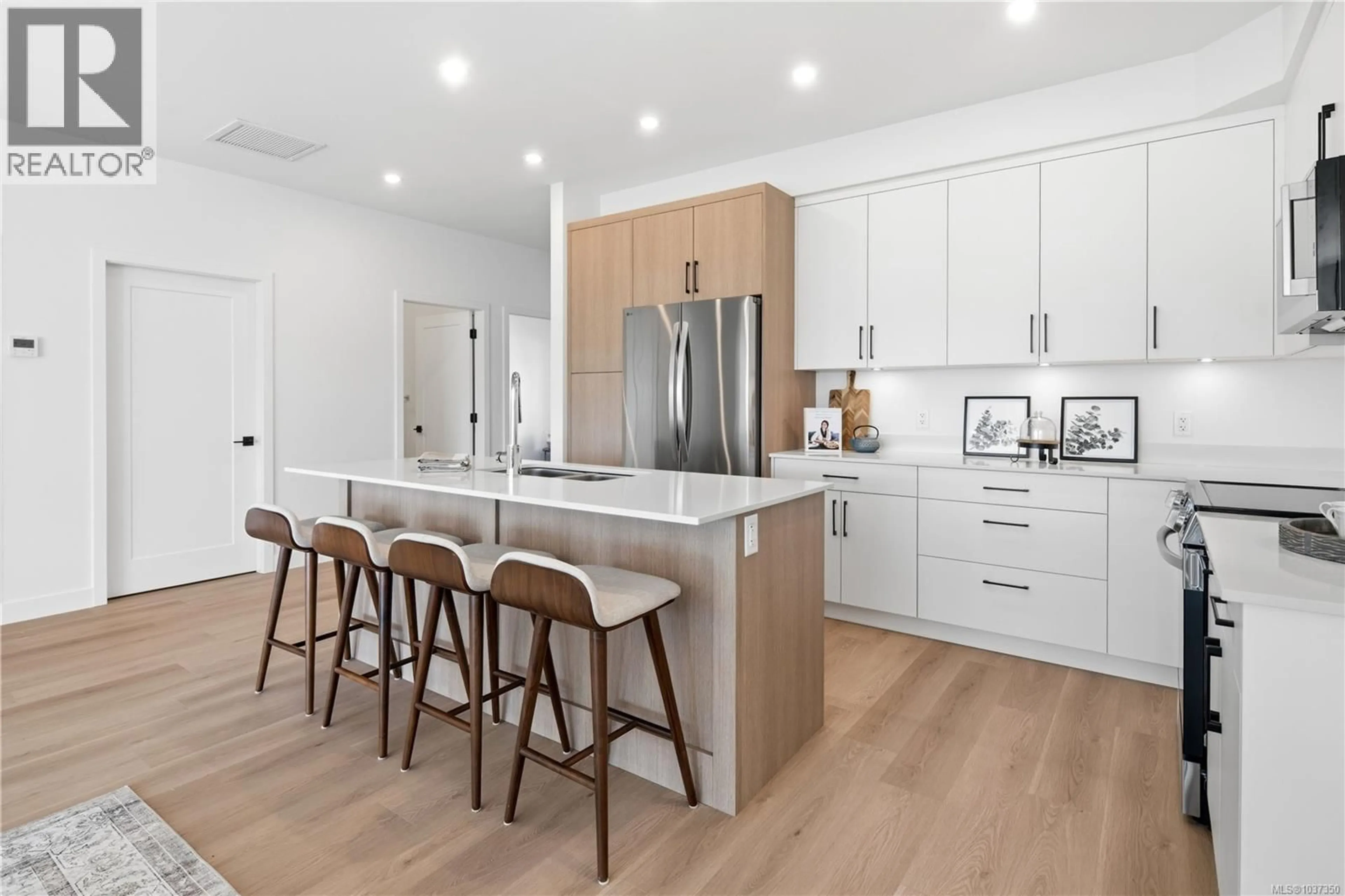 Open concept kitchen, unknown for 301 - 7057 CENTRAL SAANICH ROAD, Central Saanich British Columbia V8M1Y3
