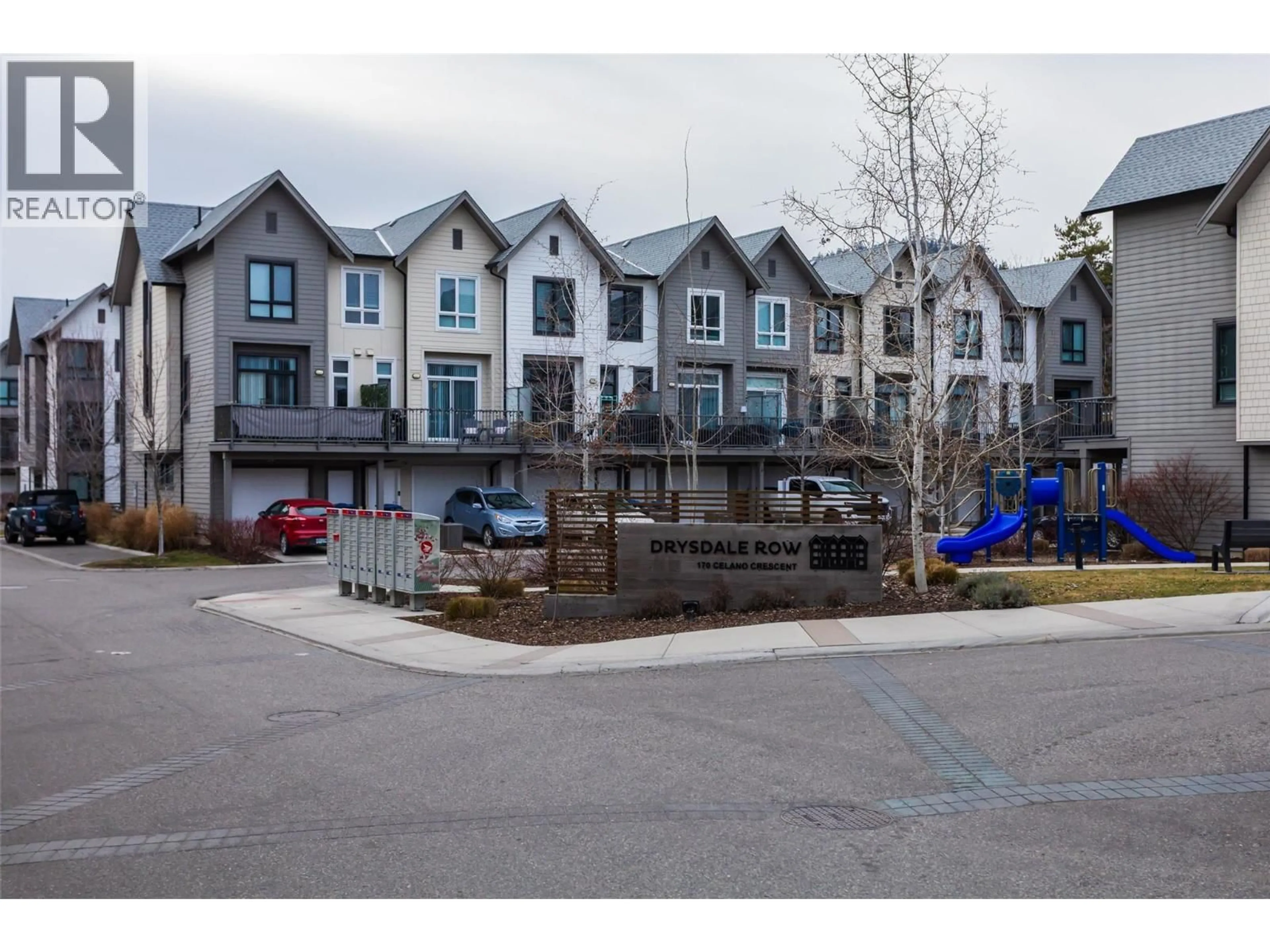 A pic from outside/outdoor area/front of a property/back of a property/a pic from drone, street for 4 - 170 CELANO CRESCENT, Kelowna British Columbia V1V0B6