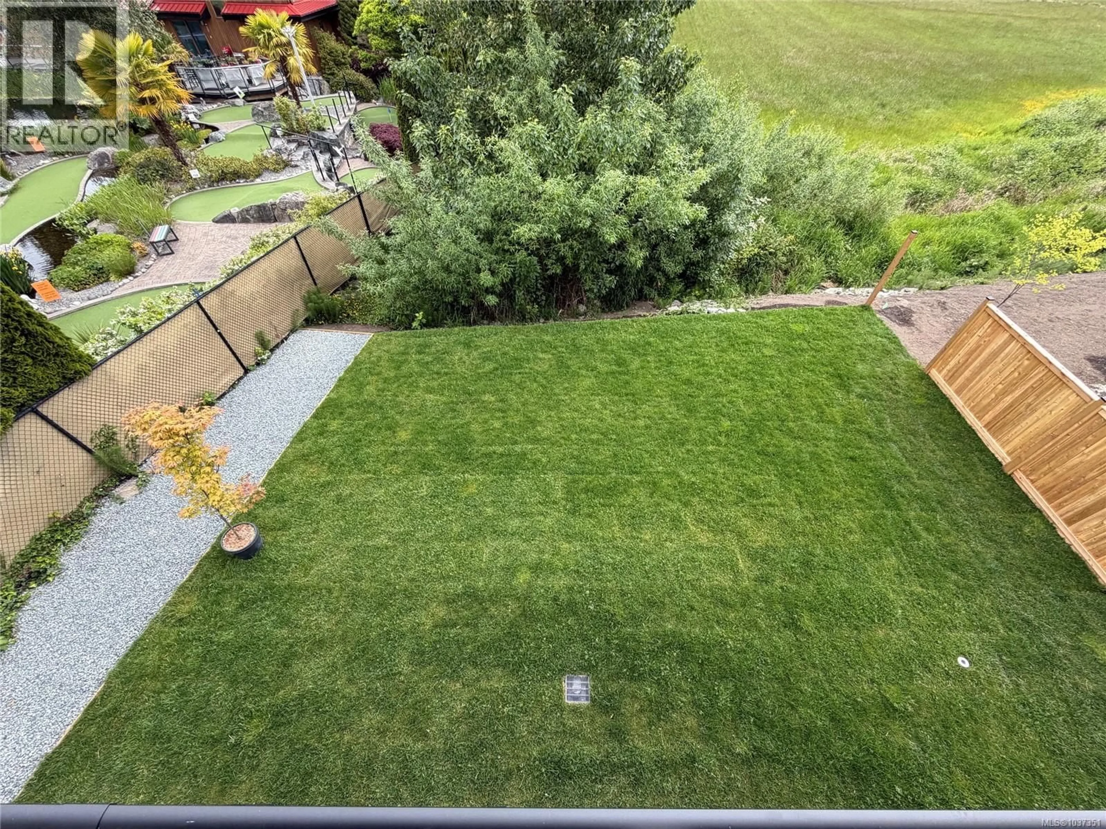 A pic from outside/outdoor area/front of a property/back of a property/a pic from drone, mountain view for 101 - 7057 CENTRAL SAANICH ROAD, Central Saanich British Columbia V8M1Y3