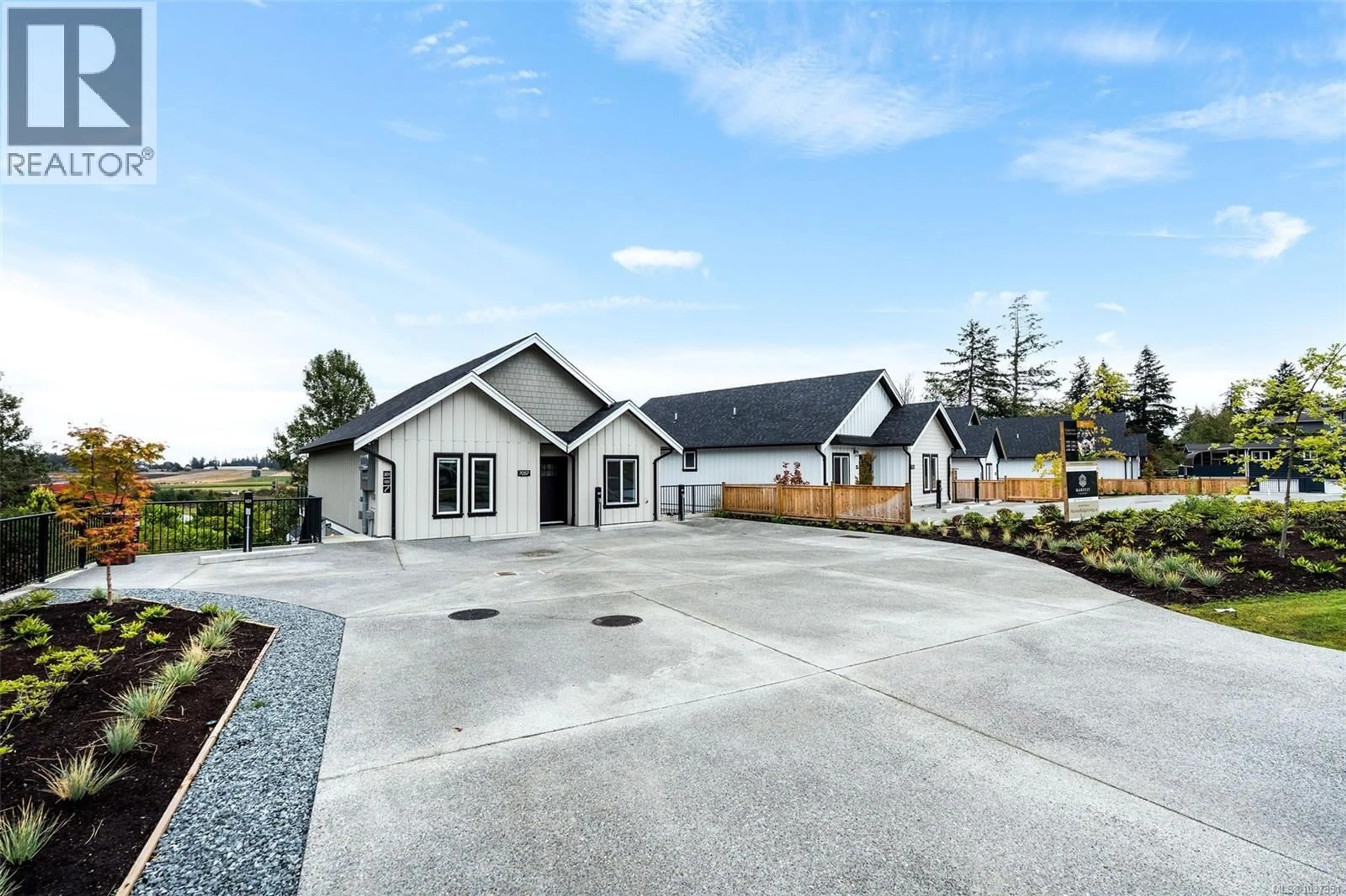 A pic from outside/outdoor area/front of a property/back of a property/a pic from drone, unknown for 101 - 7057 CENTRAL SAANICH ROAD, Central Saanich British Columbia V8M1Y3
