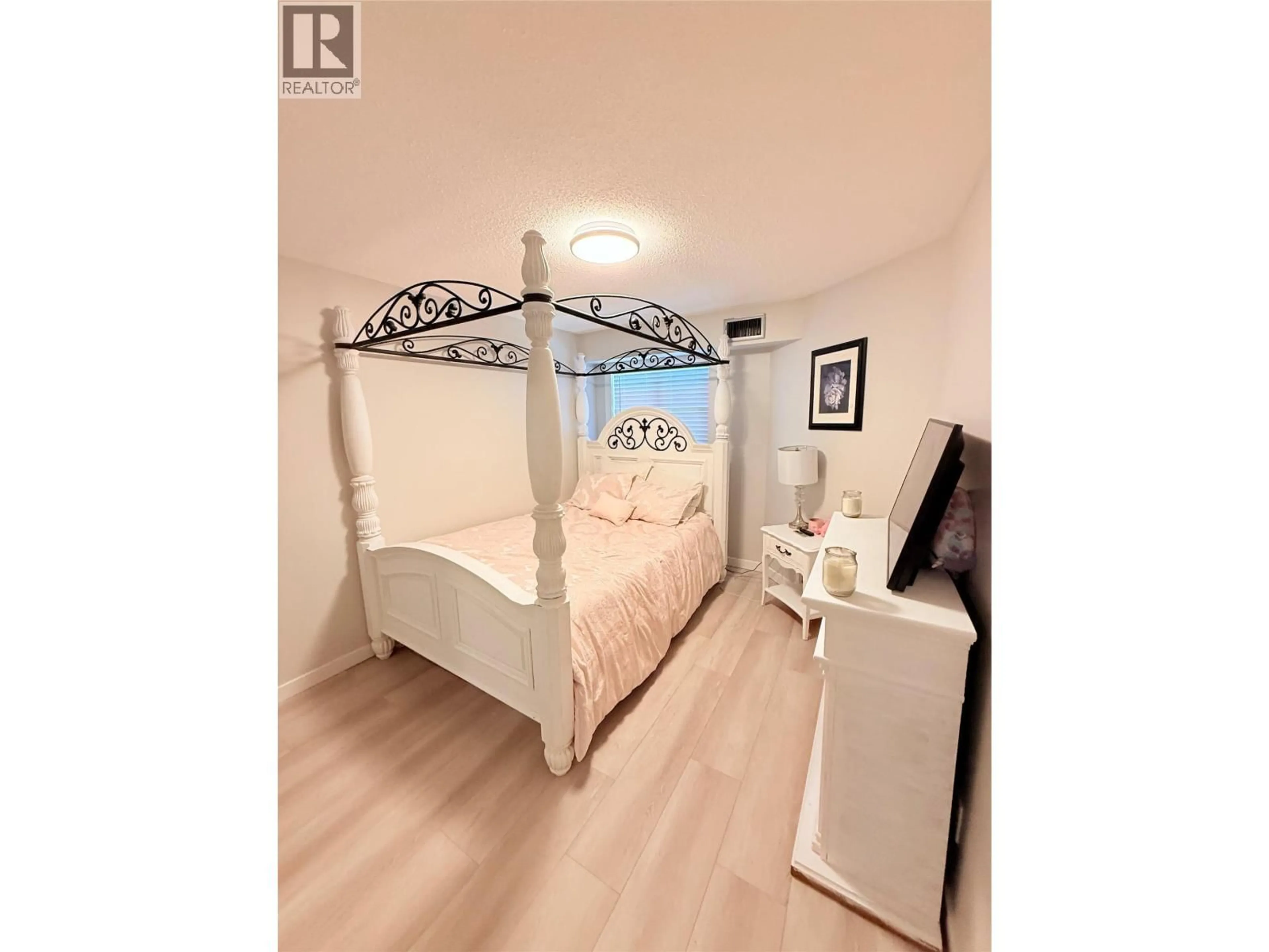 Bedroom with bed, wood/laminate floor for 348 - 245 GORDONHORN CRESCENT, Kamloops British Columbia V2E1G5