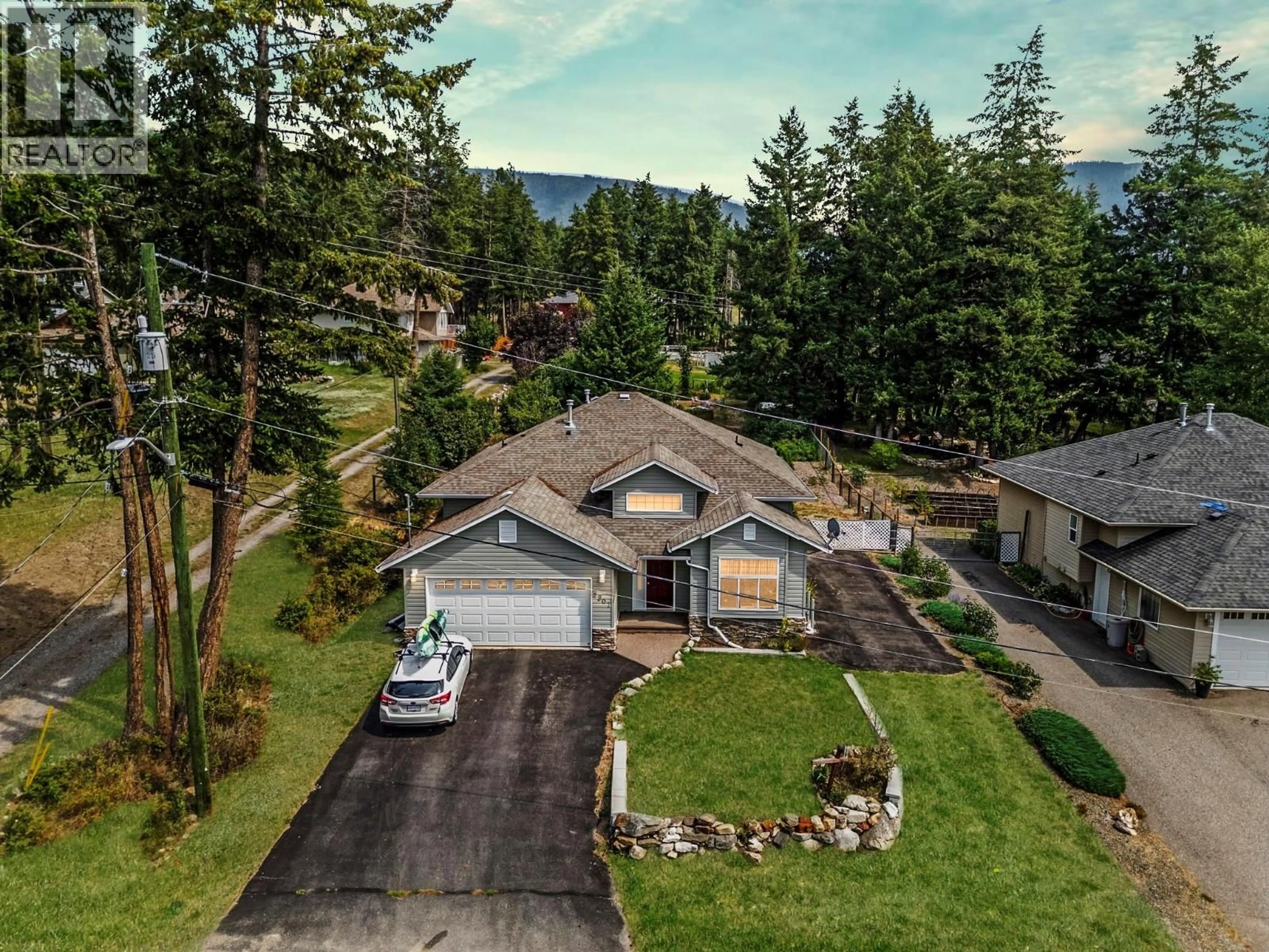 A pic from outside/outdoor area/front of a property/back of a property/a pic from drone, mountain view for 2907 GYP ROAD, Falkland British Columbia V0E1W0