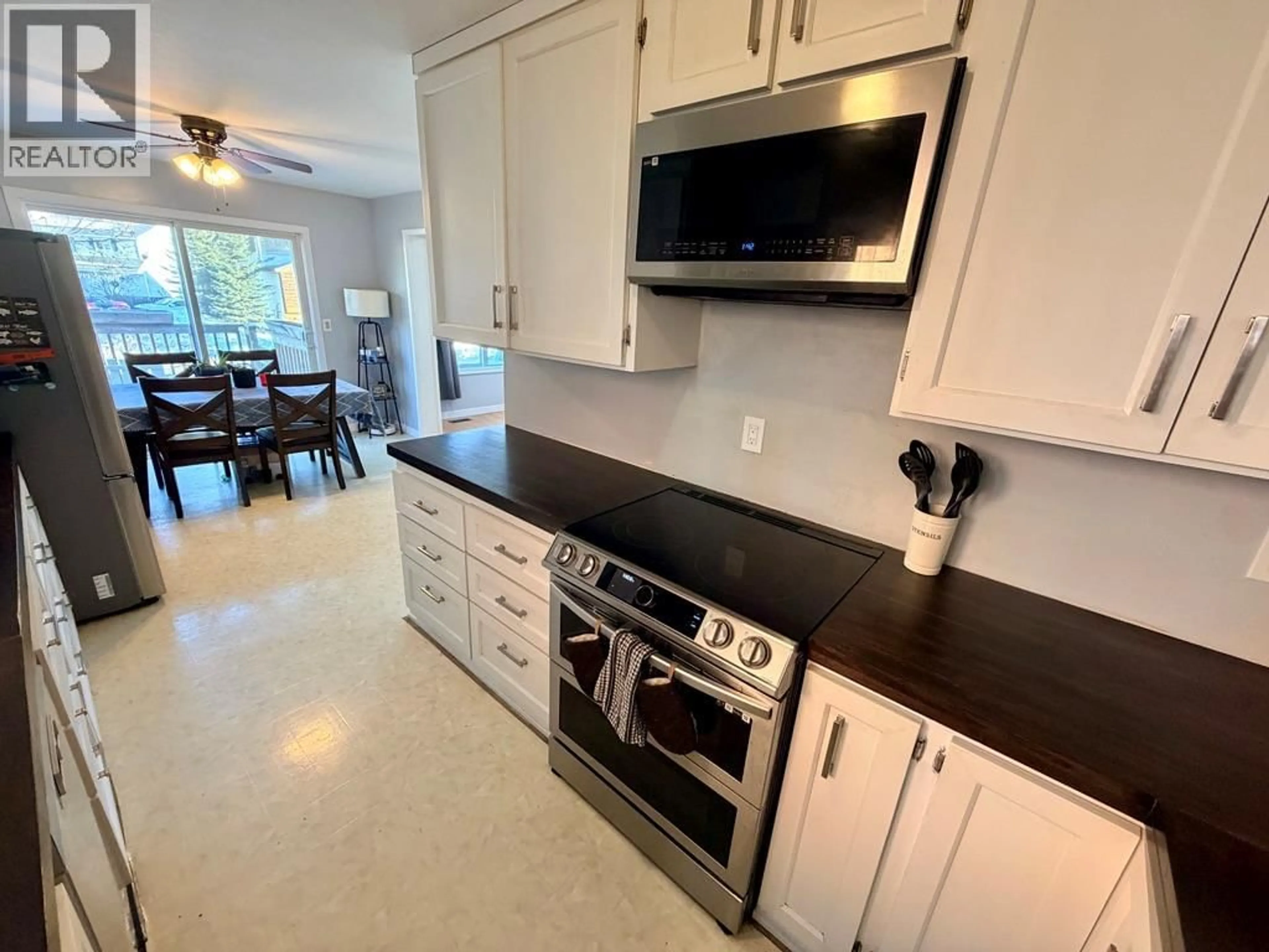 Open concept kitchen, ceramic/tile floor for 151 WOLVERINE AVENUE, Tumbler Ridge British Columbia V0C2W0