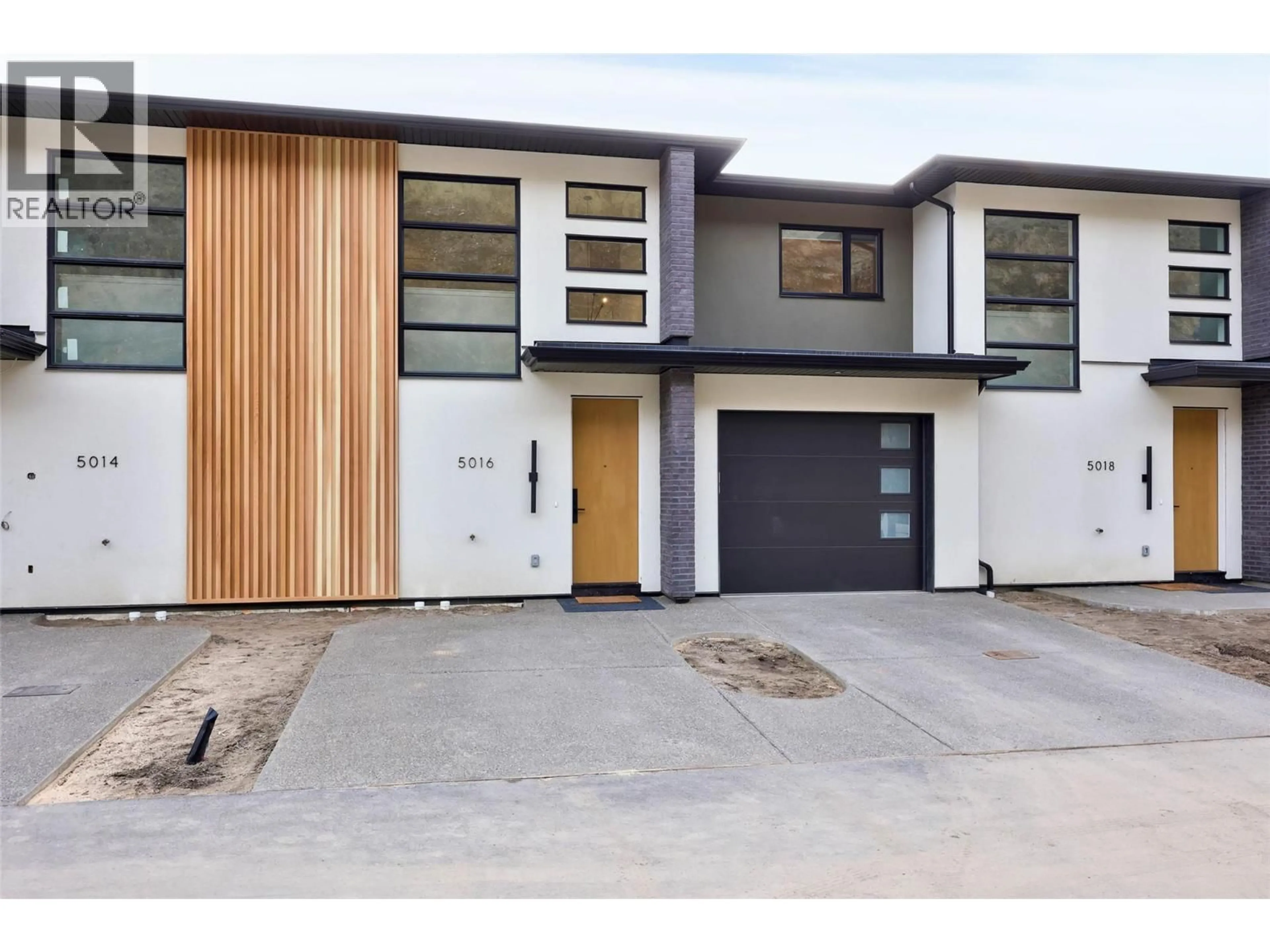 Home with brick exterior material, street for 5046 SUN RIVERS DRIVE, Kamloops British Columbia V2H0E7