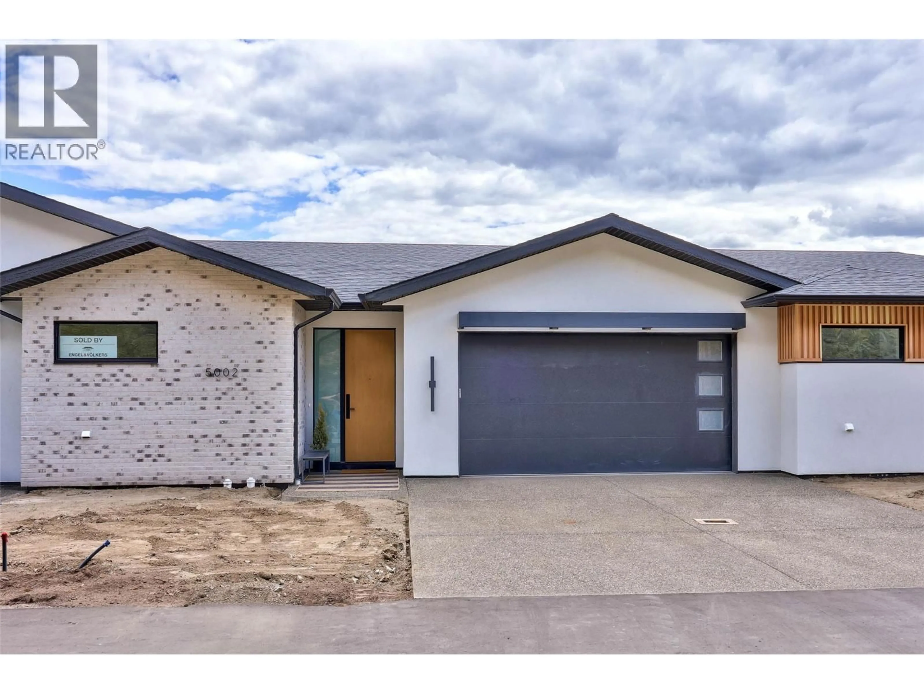 Home with brick exterior material, street for 5048 SUN RIVERS DRIVE, Kamloops British Columbia V2H0E7