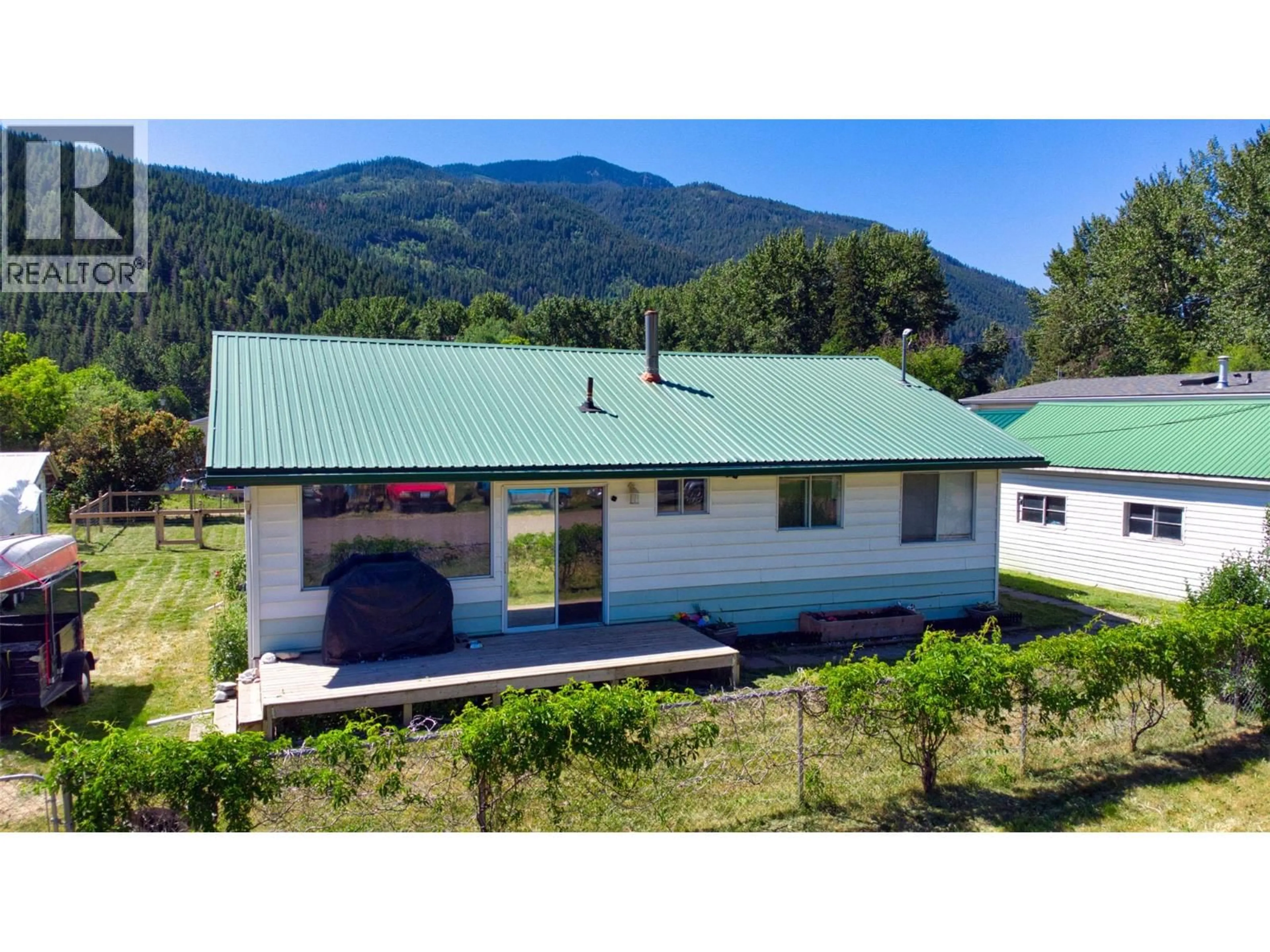 A pic from outside/outdoor area/front of a property/back of a property/a pic from drone, mountain view for 5783 PONDEROSA ROAD, Falkland British Columbia V0E1W0
