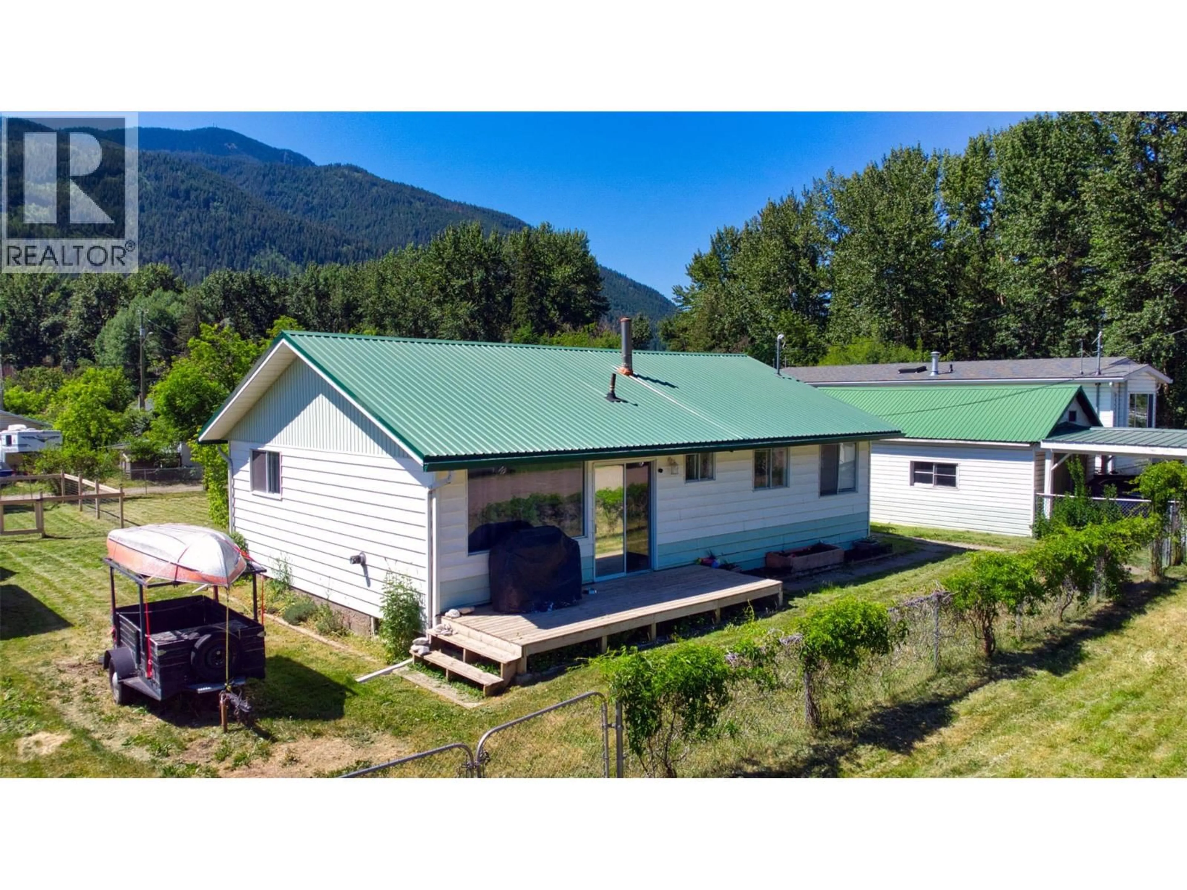 A pic from outside/outdoor area/front of a property/back of a property/a pic from drone, mountain view for 5783 PONDEROSA ROAD, Falkland British Columbia V0E1W0