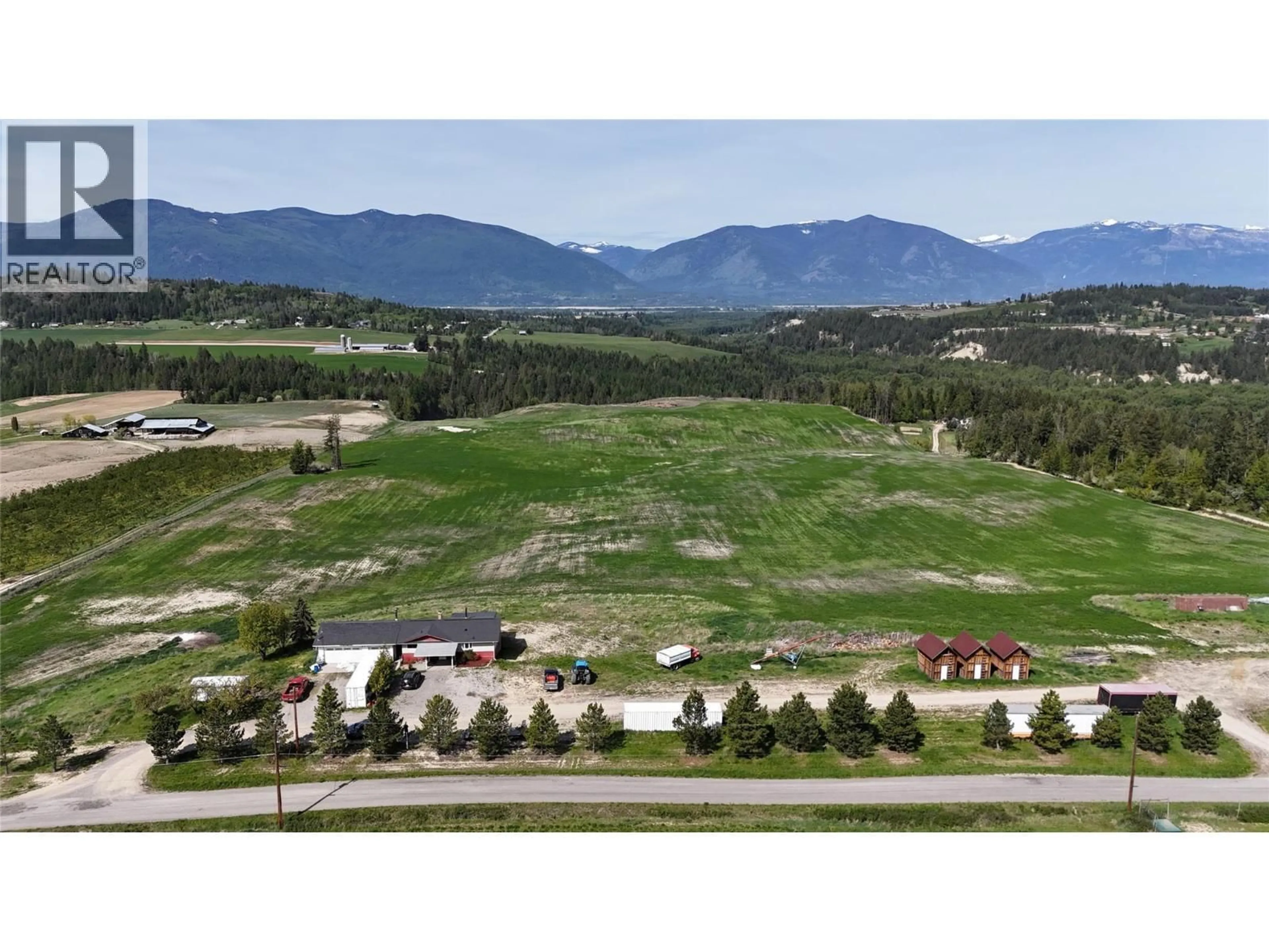 A pic from outside/outdoor area/front of a property/back of a property/a pic from drone, mountain view for 3853 MUZZY ROAD, Creston British Columbia V0B1C1